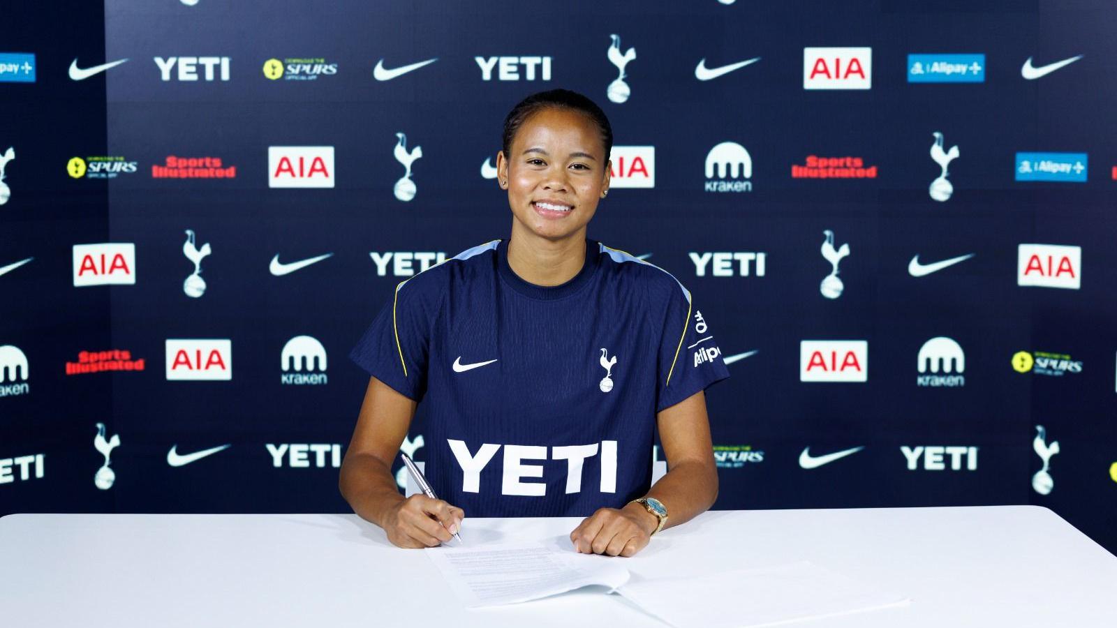 Alice Sombath signing for Tottenham