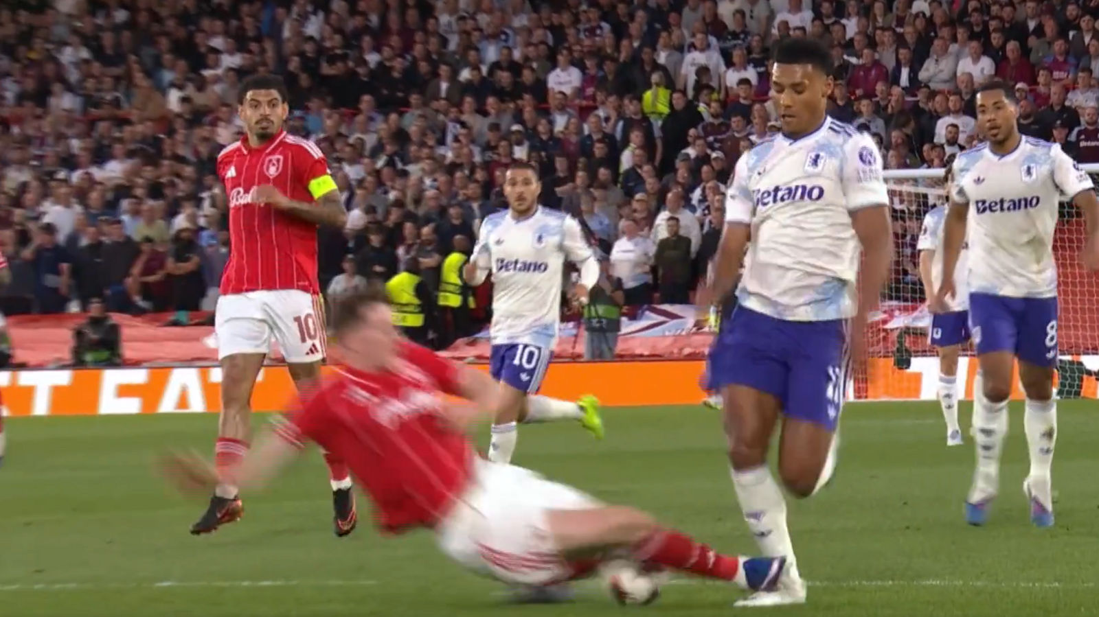 Elliot Anderson tackles Ollie Watkins