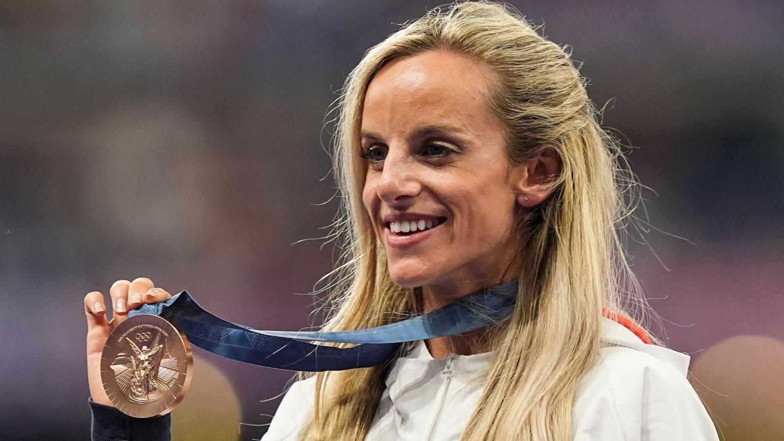 Georgia Bell poses with her Olympic medal in Paris