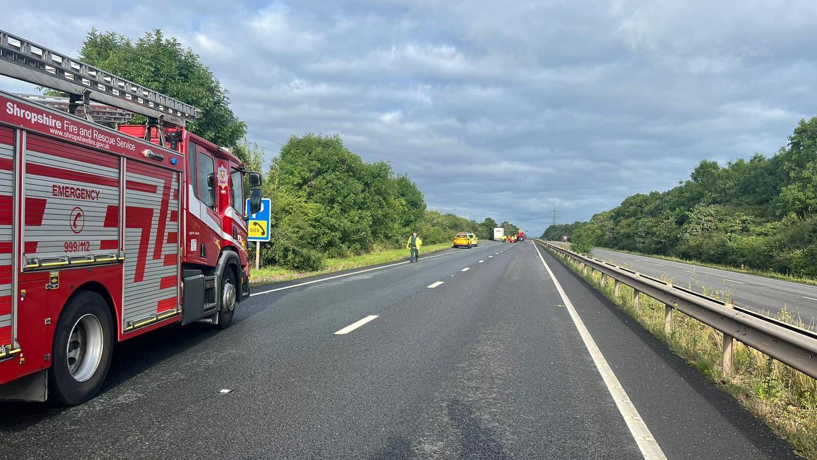 A picture of a red fire engine on the side of the A5