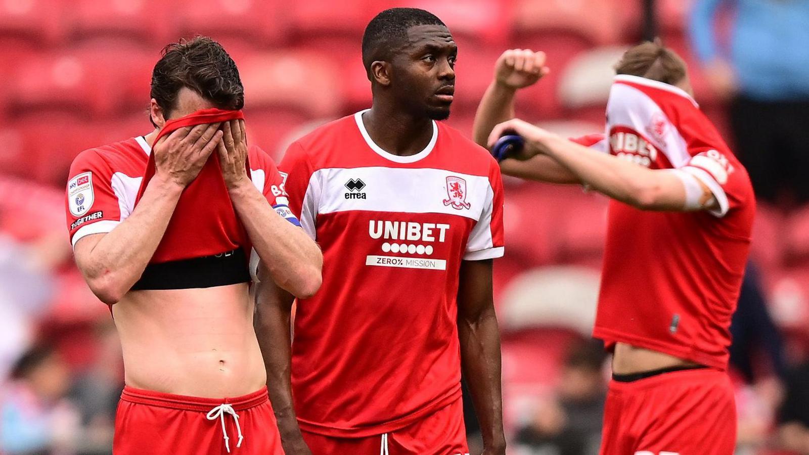 Middlesbrough players dejected after promotion hopes were dented