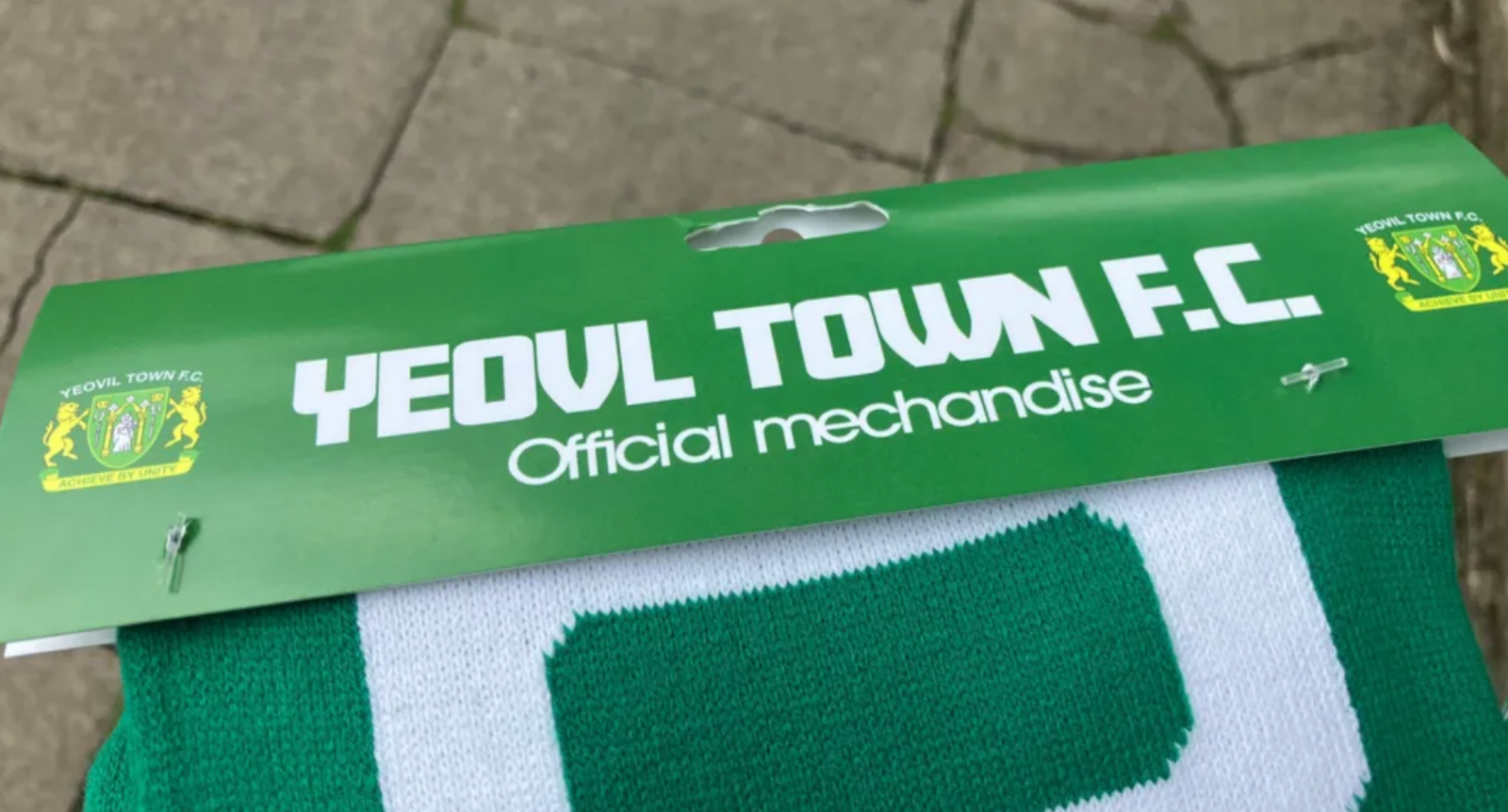 Yeovil Town's scarf with spelling mistakes on the packaging