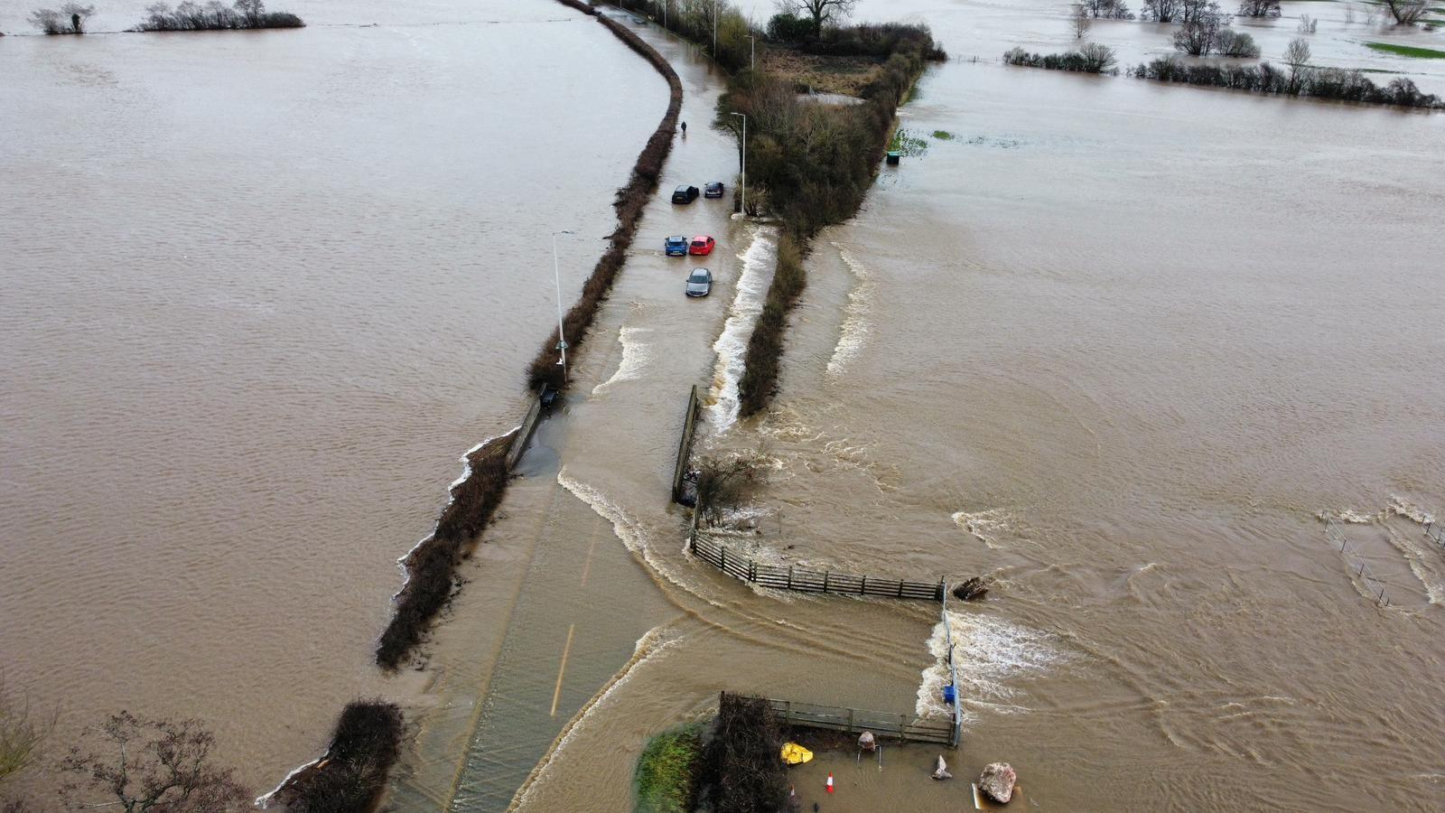 A photo of cars stranded in floodwaters