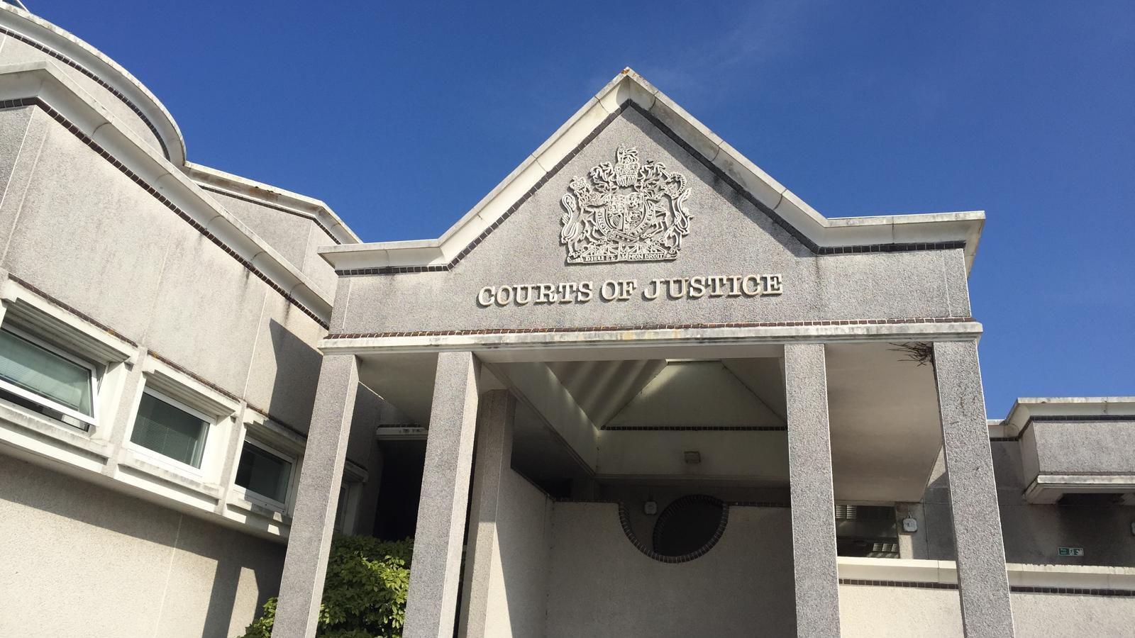 The outside of Truro Crown Court, a grey stone building with pillars.
