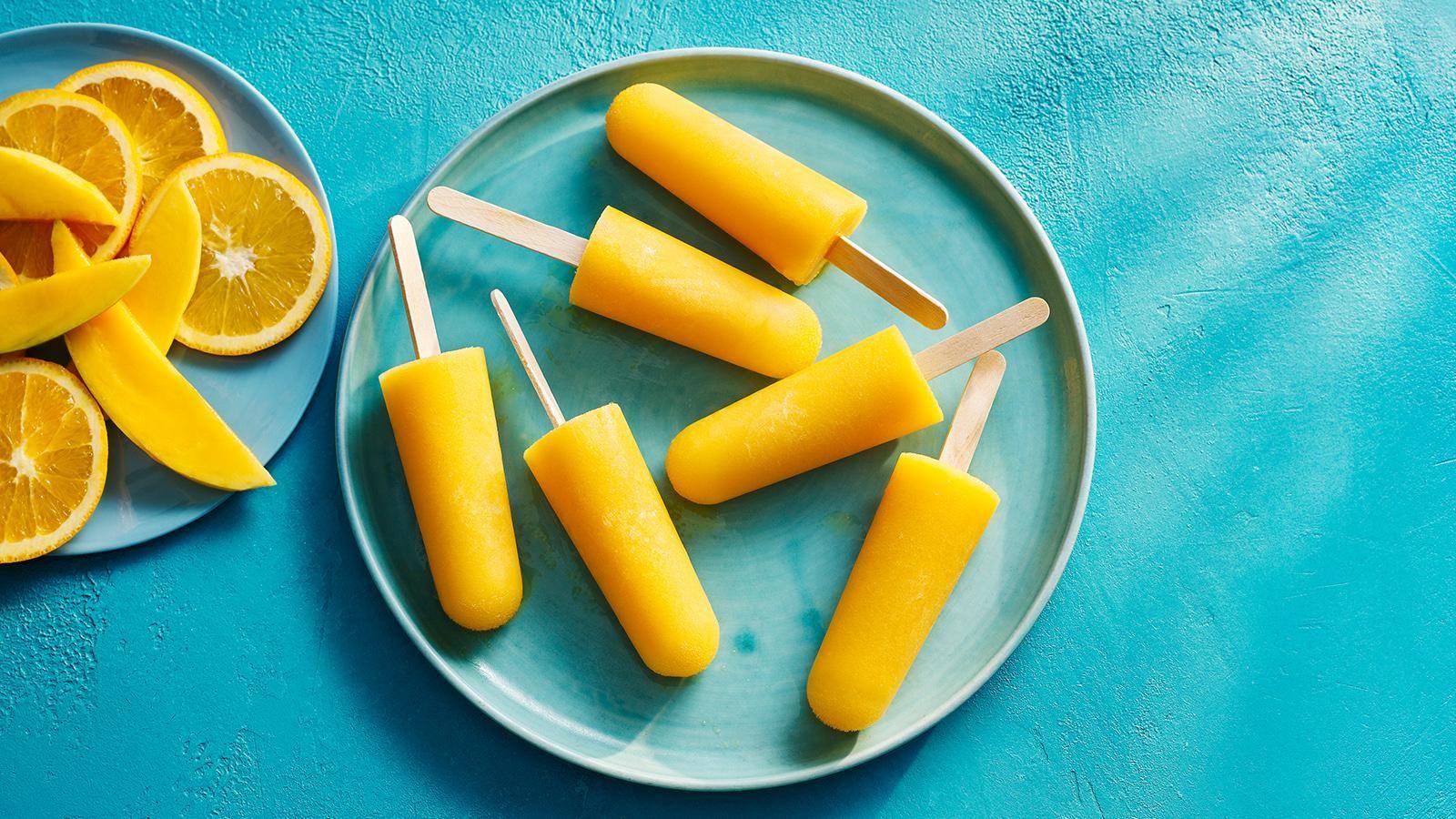Orange and mango ice lollies
