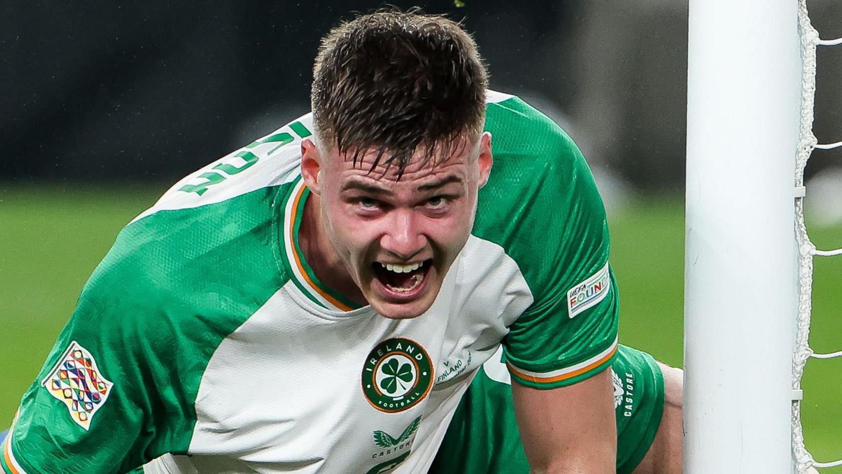 Evan Ferguson celebrates scoring his fourth international goal