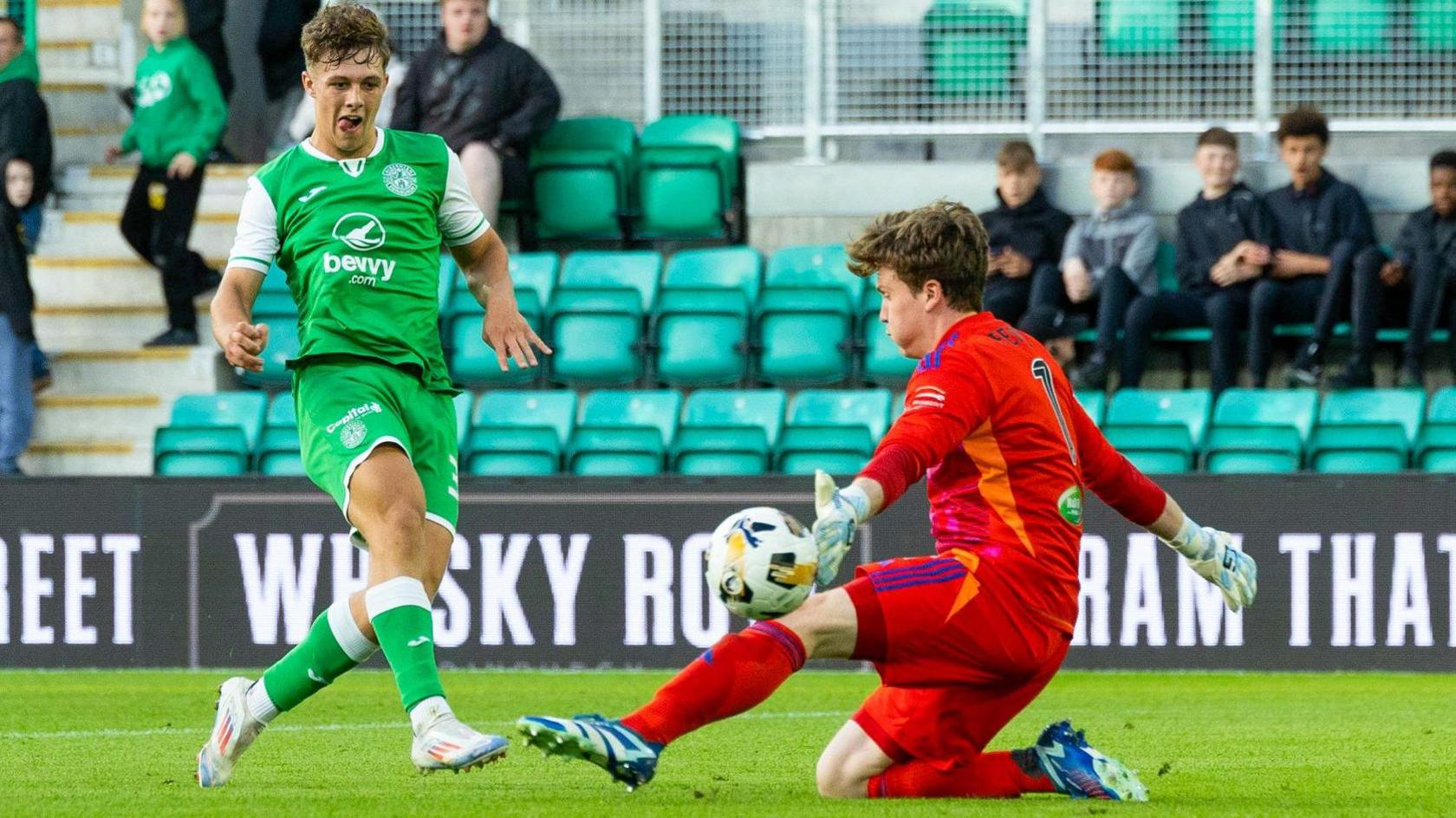 Hibernian midfielder Rudi Molotnikov scores against Queen's Park