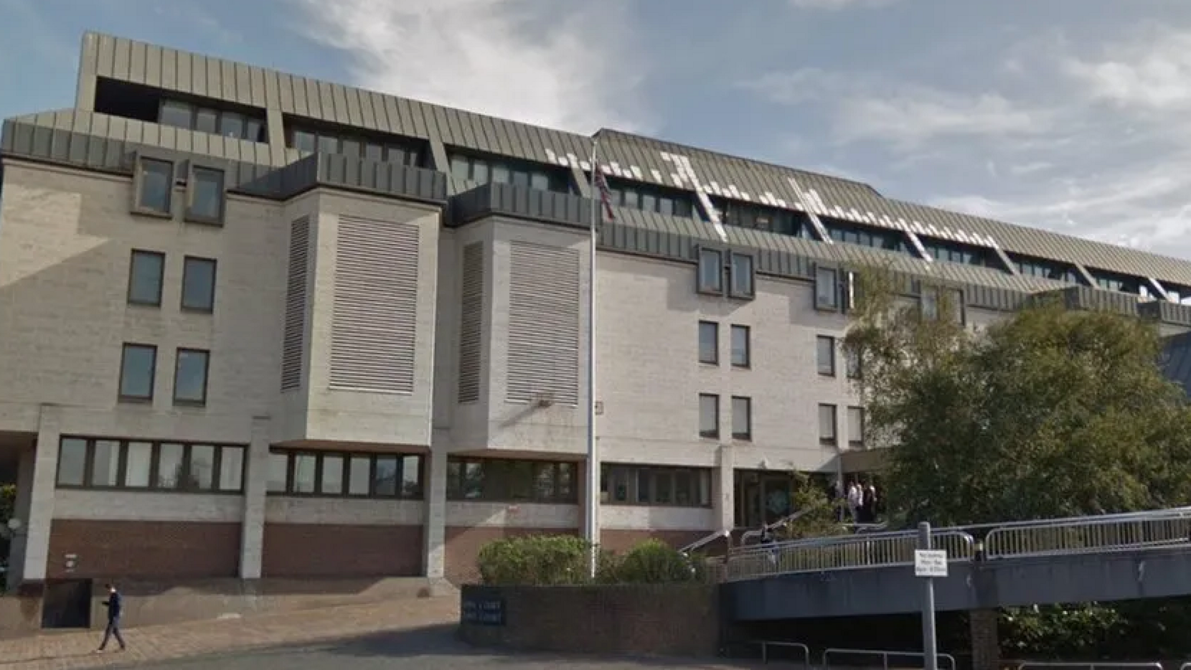 Maidstone Crown Court - a white and grey modern building with a grey roof