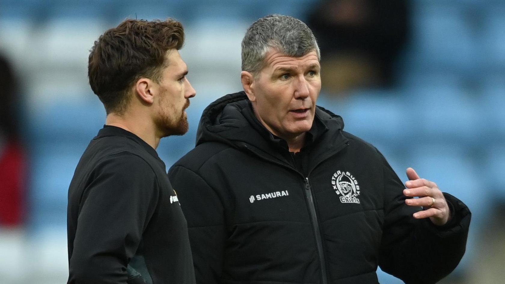 England centre Henry Slade talks to Rob Baxter