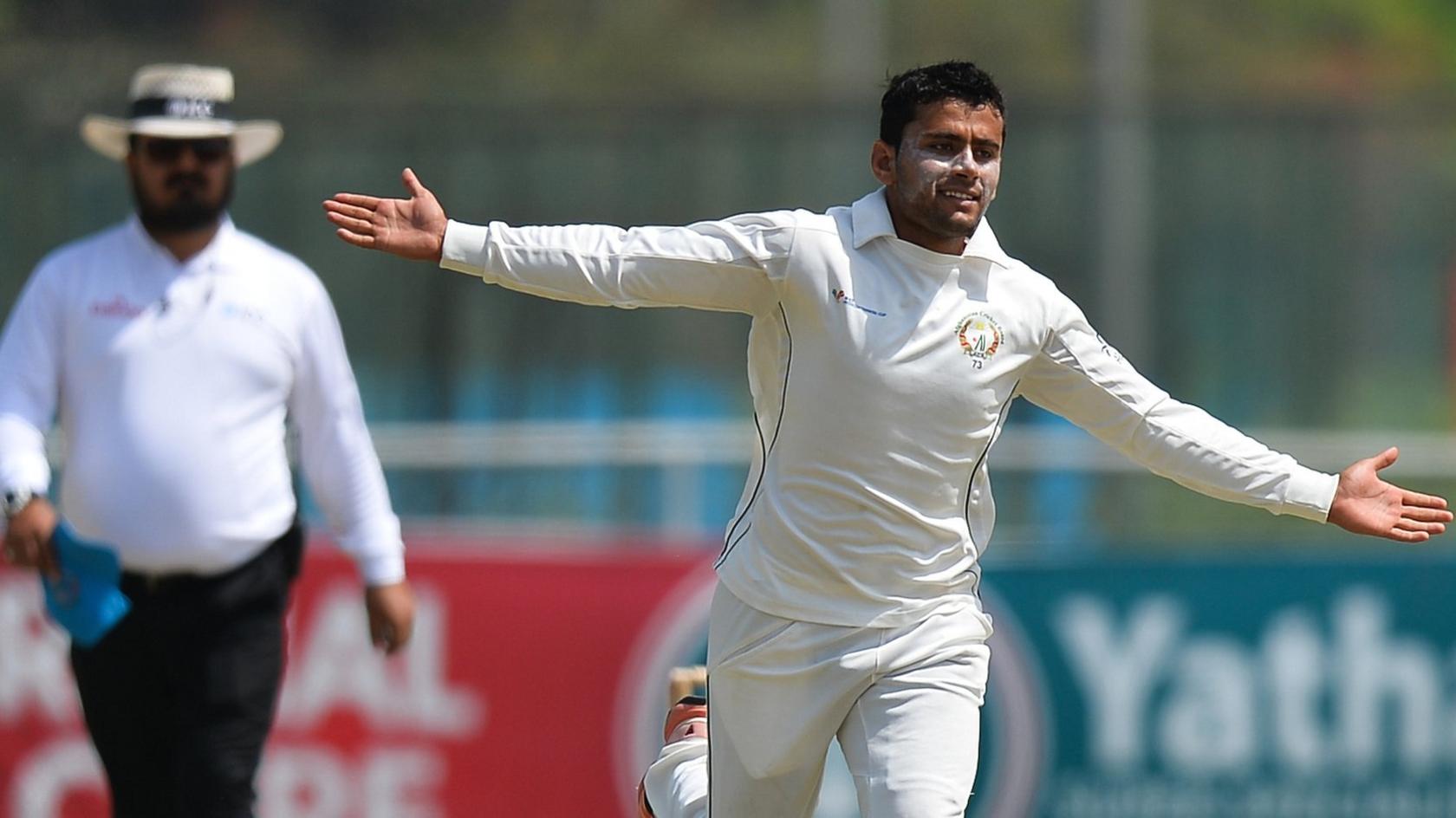 Afghanistan's Zahir Khan celebrates a wicket