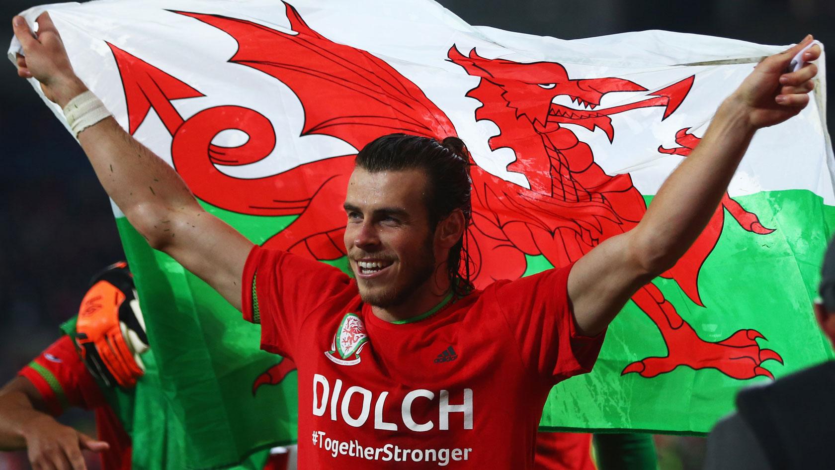 Gareth Bale with the Wales flag