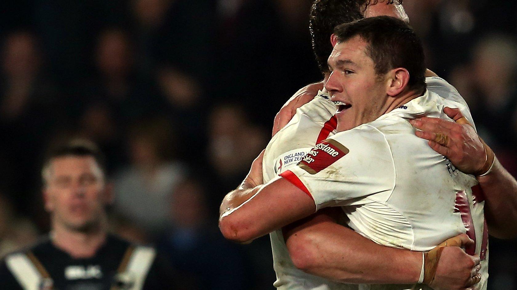 England's Brett Ferres celebrates scoring a try