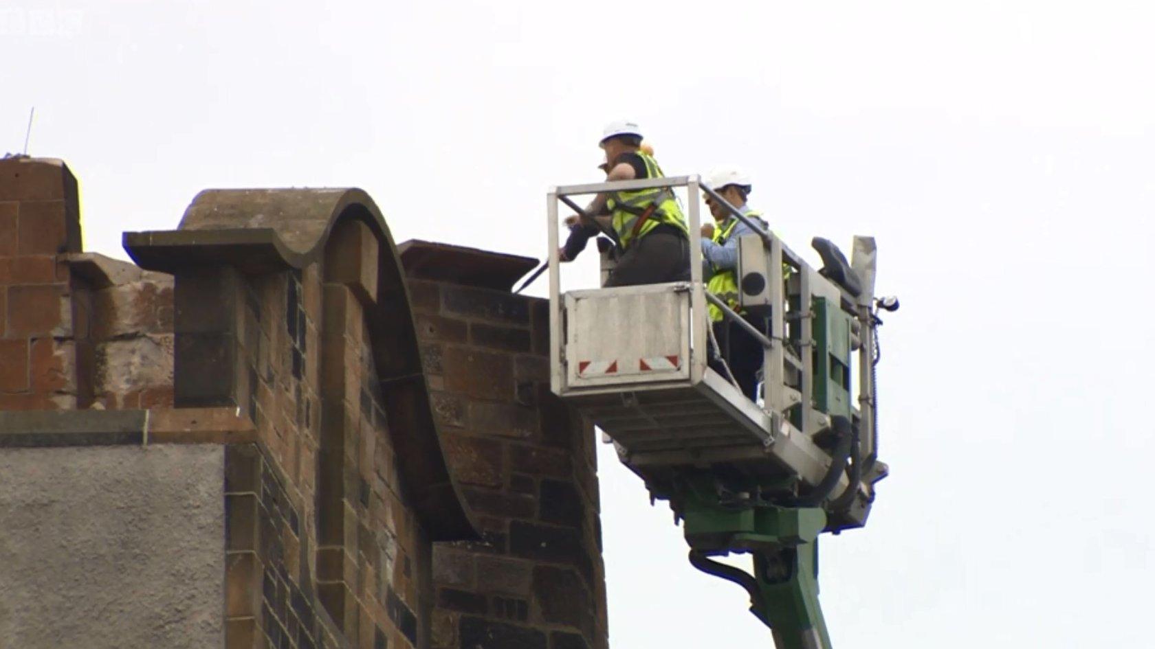 Demolition workers at art school site