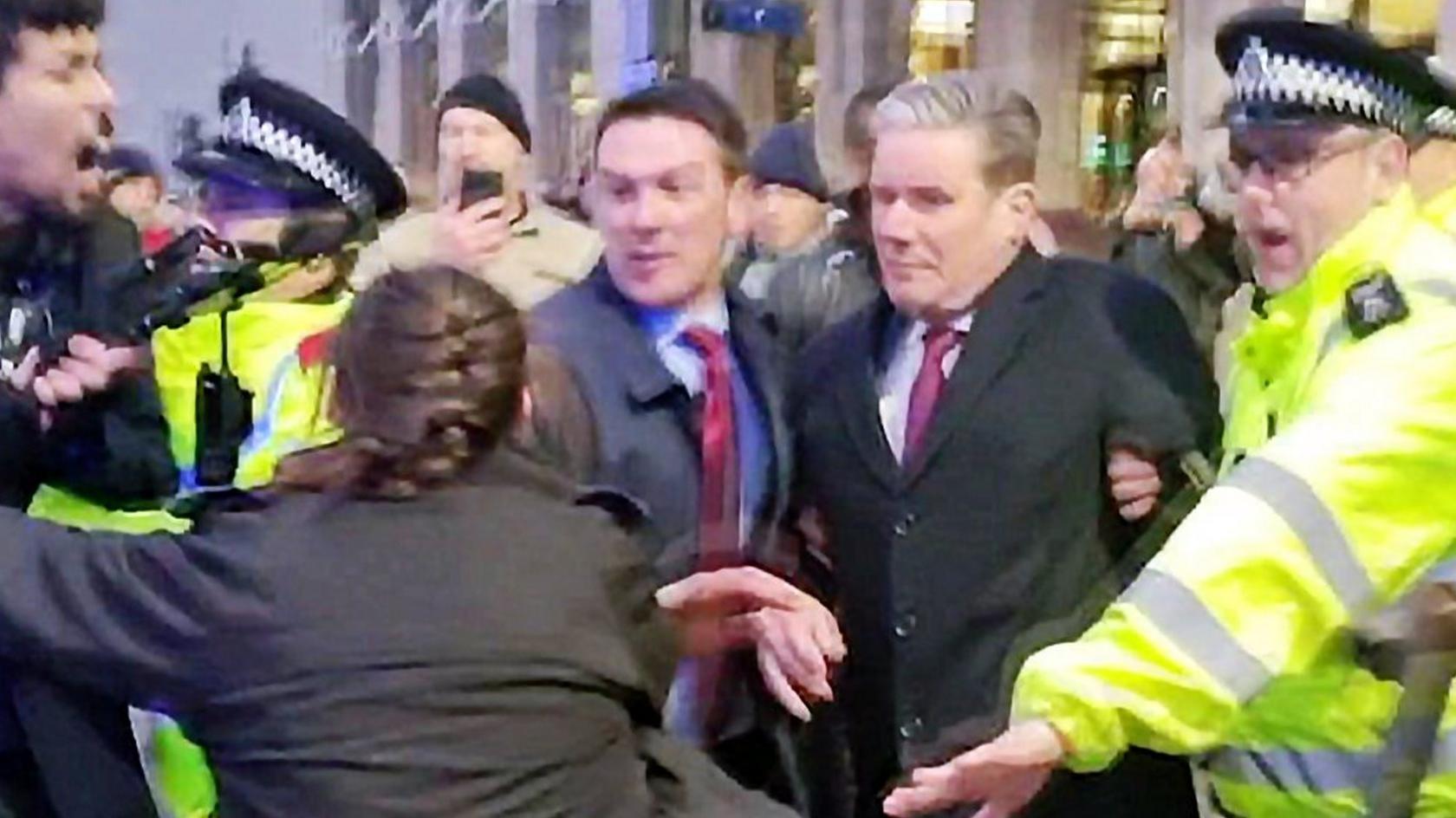 Sir Keir Starmer protected by police