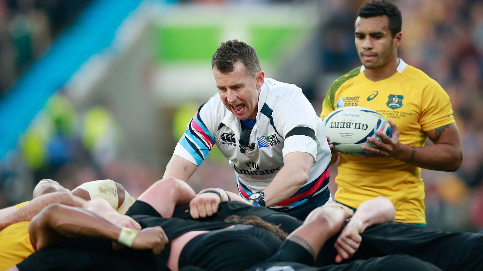 Nigel Owens takes control at a scrum in the 2015 World Cup final