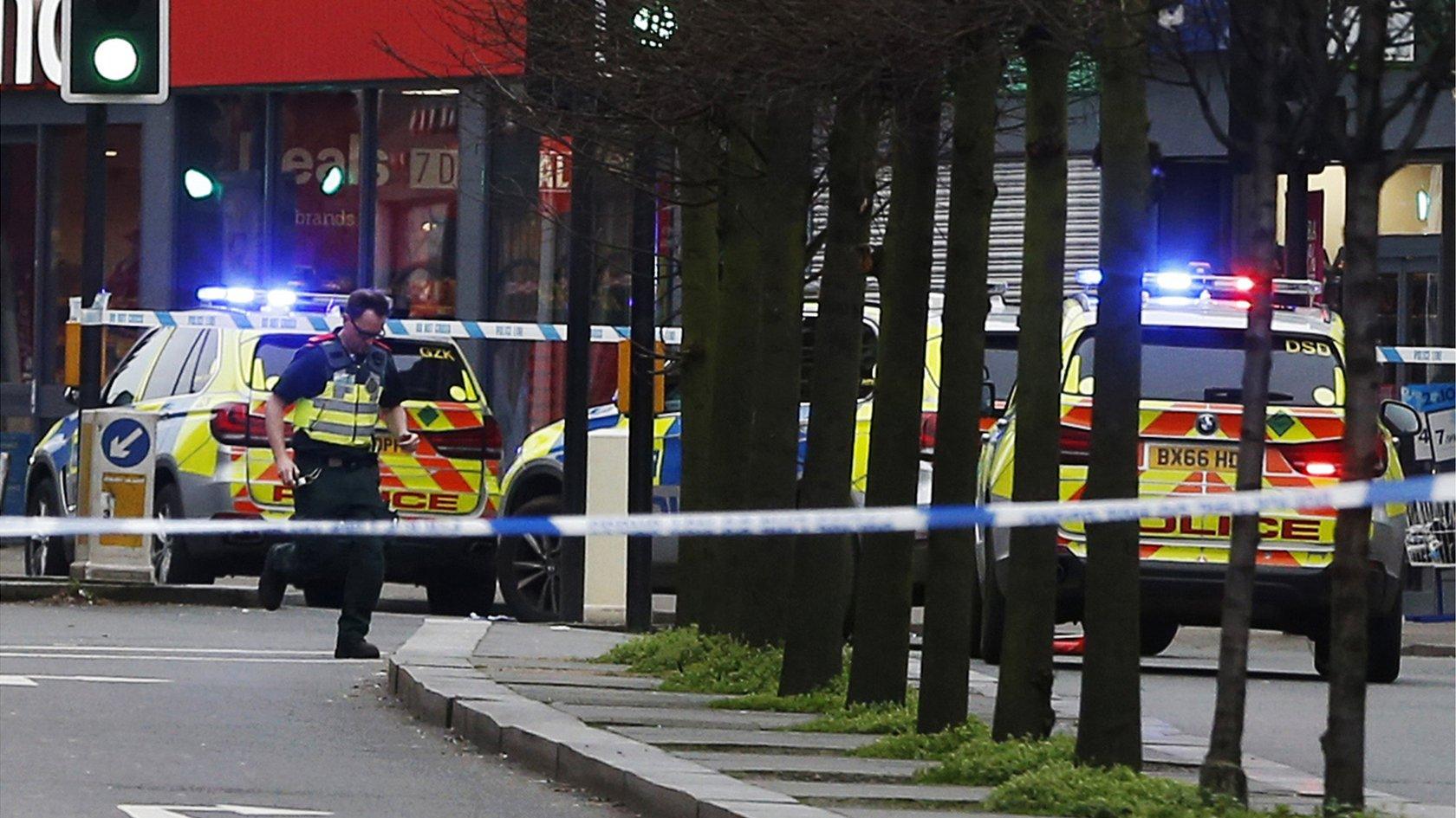 Police officers at the scene in London after a man was shot and killed by armed police, 2 February 2020