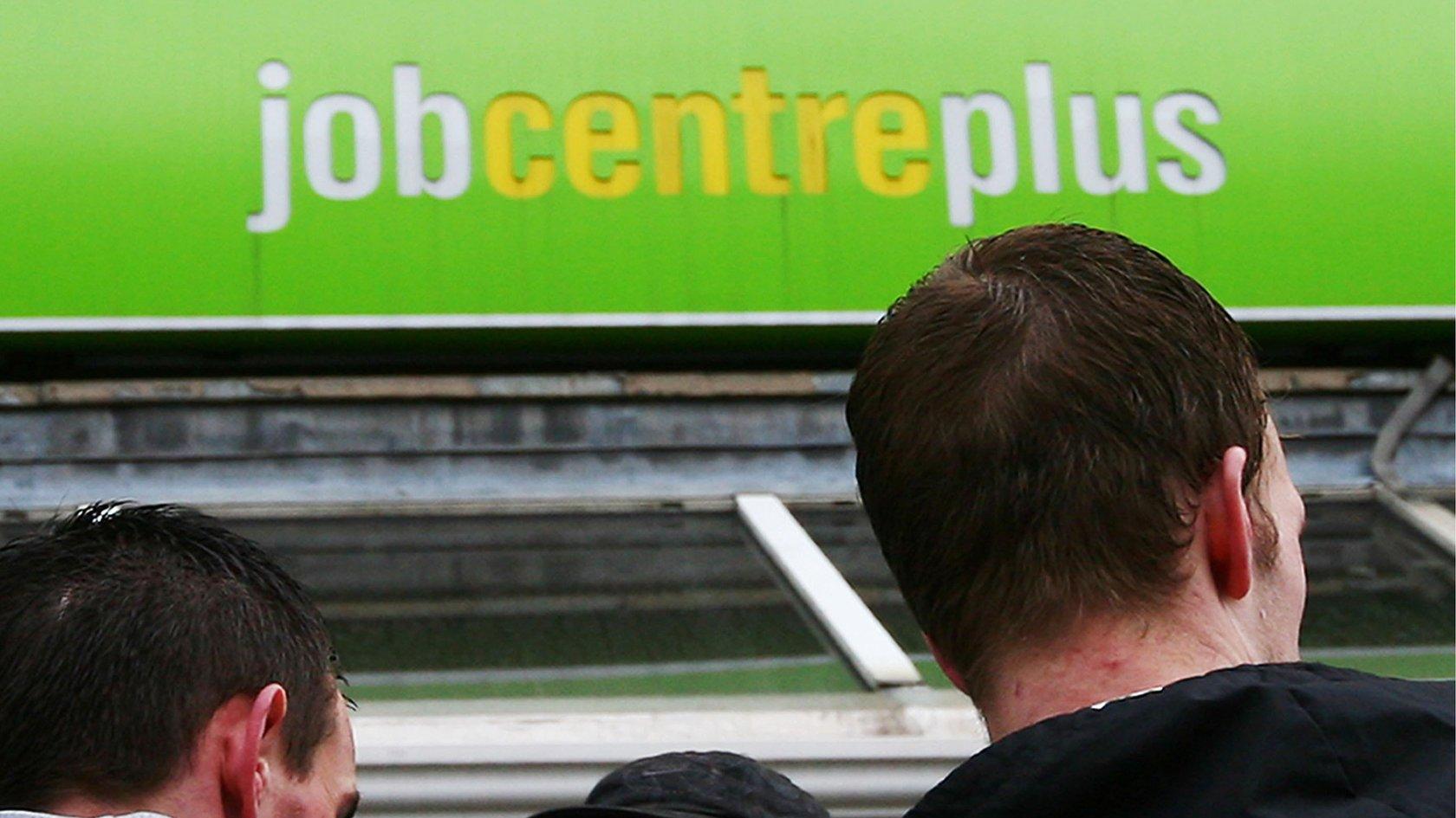 Men outside a Job Centre Plus