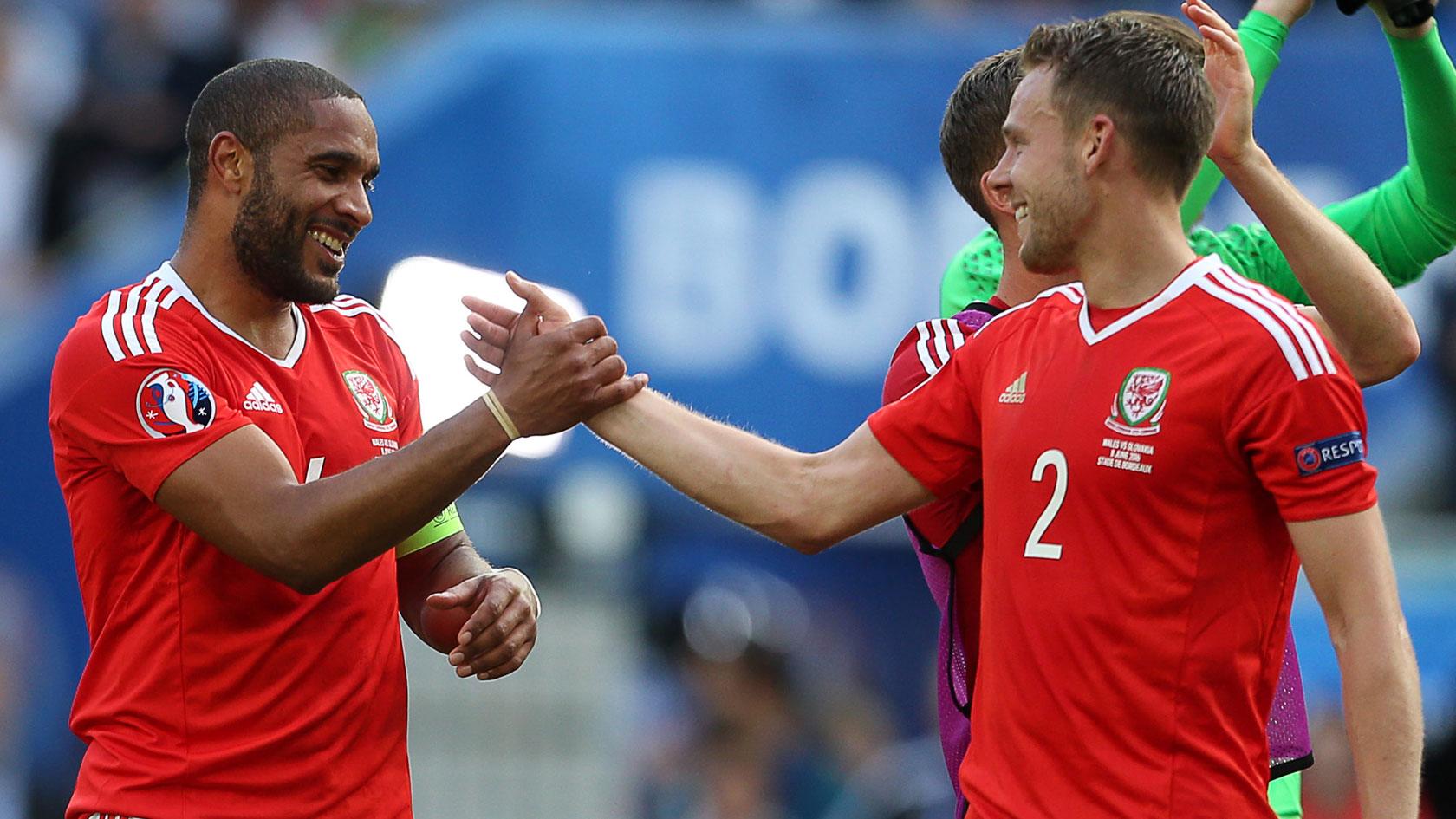 Ashley Williams and Chris Gunter celebrate Wales' 2-1 win over Slovakia at Euro 2016