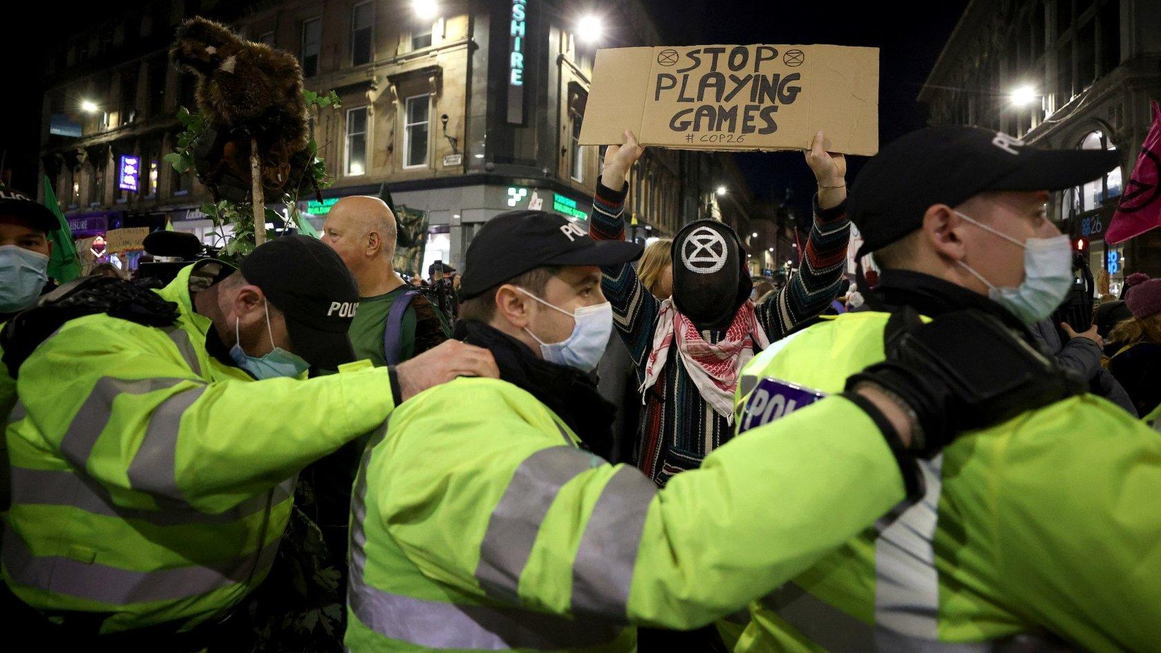 Police in Glasgow containing protesters