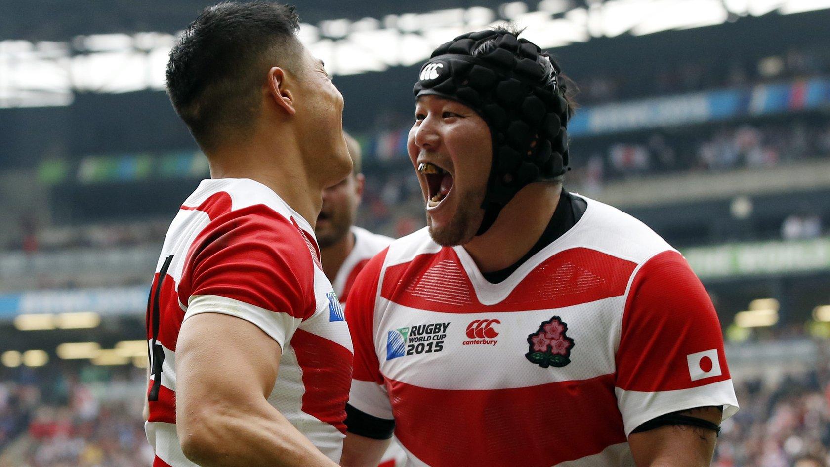 Akihito Yamada of Japan celebrates after scoring a try