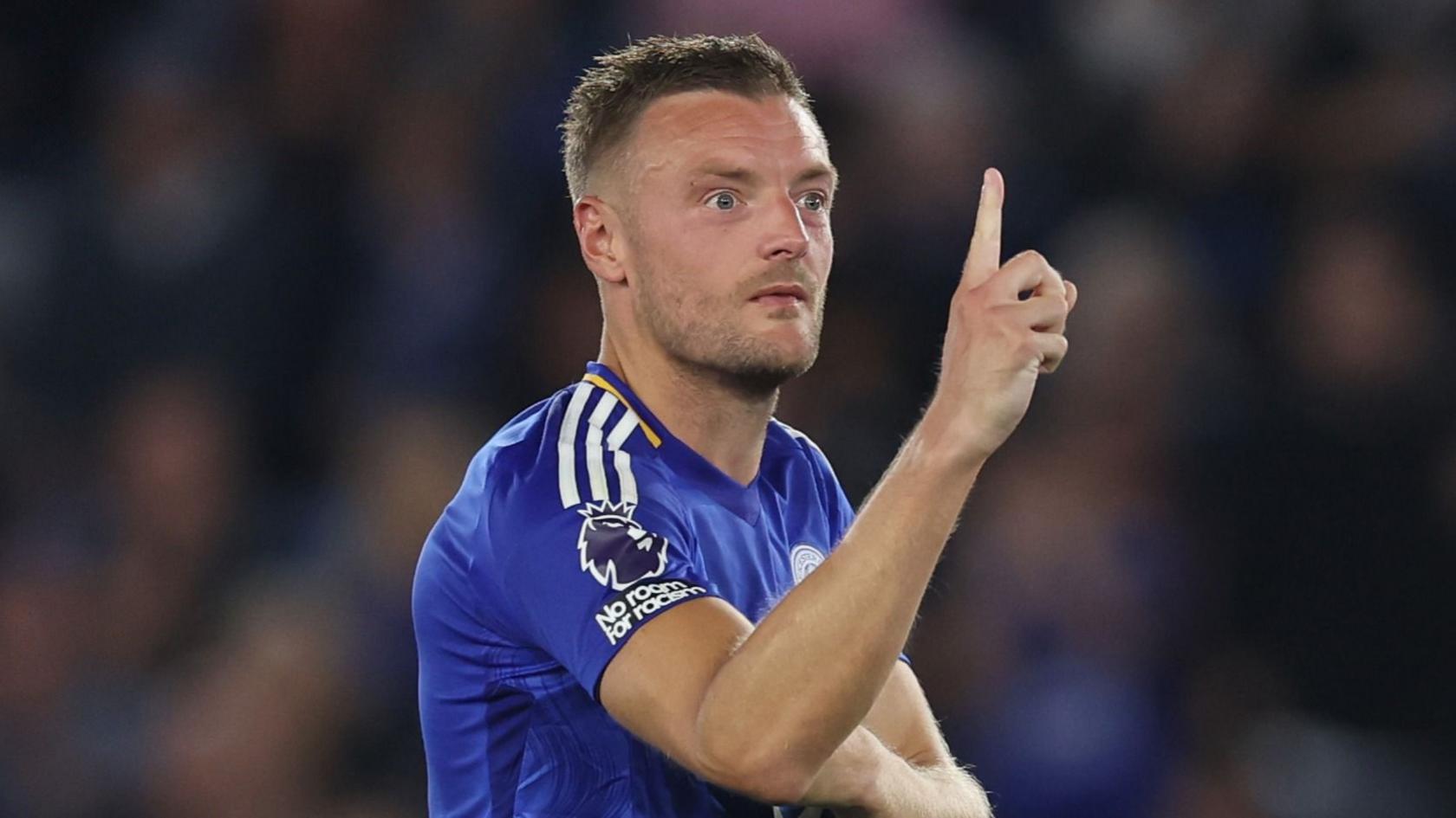 Jamie Vardy holds up one finger to Tottenham fans