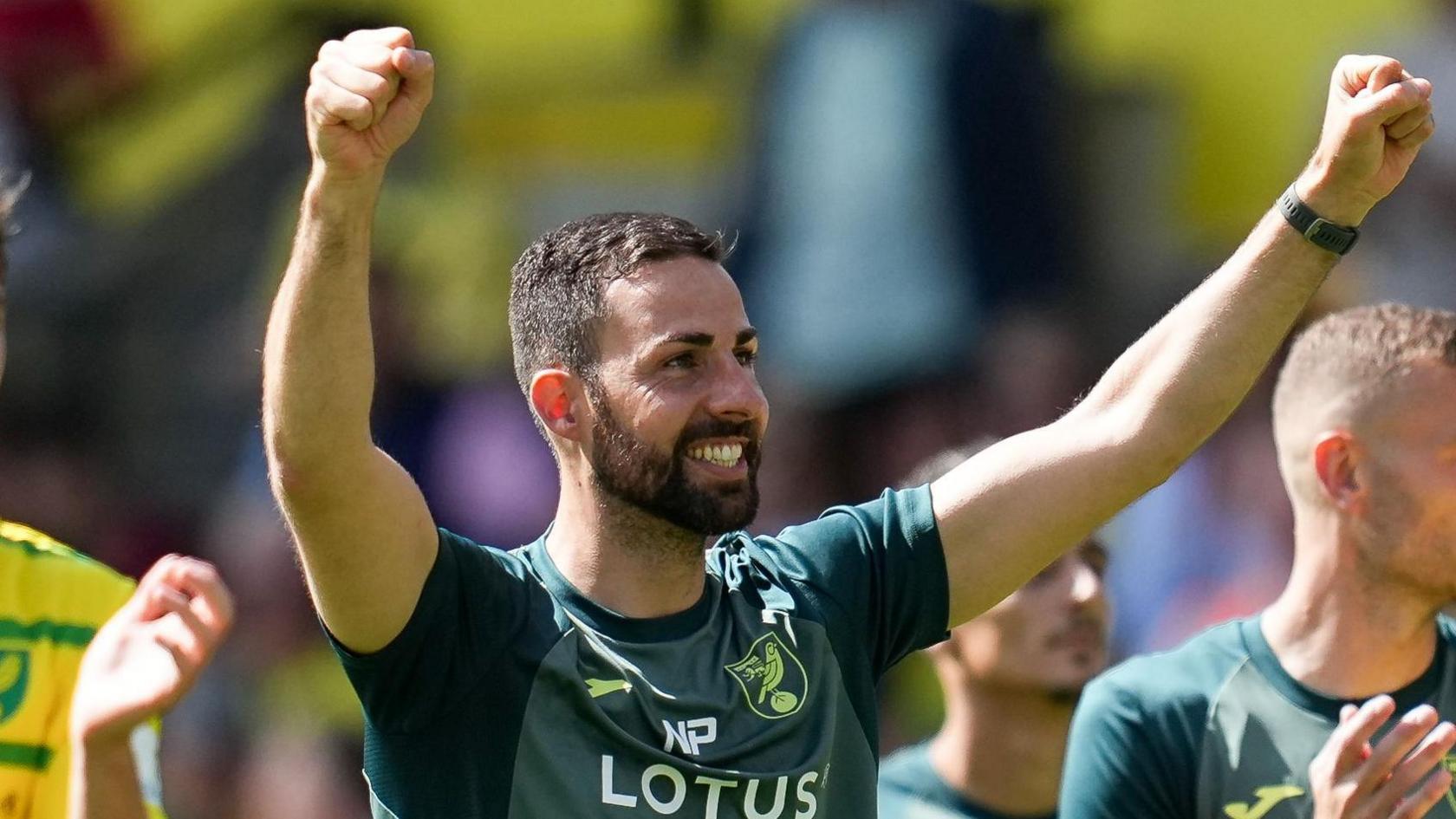 Narcis Pelach celebrates a Norwich City win with his players