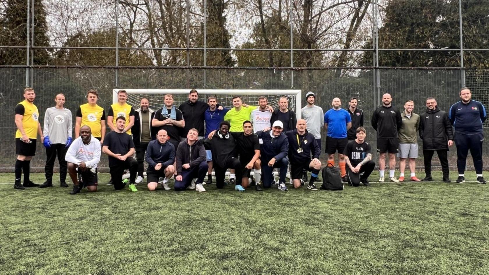 A collection of players in the homeless football league.