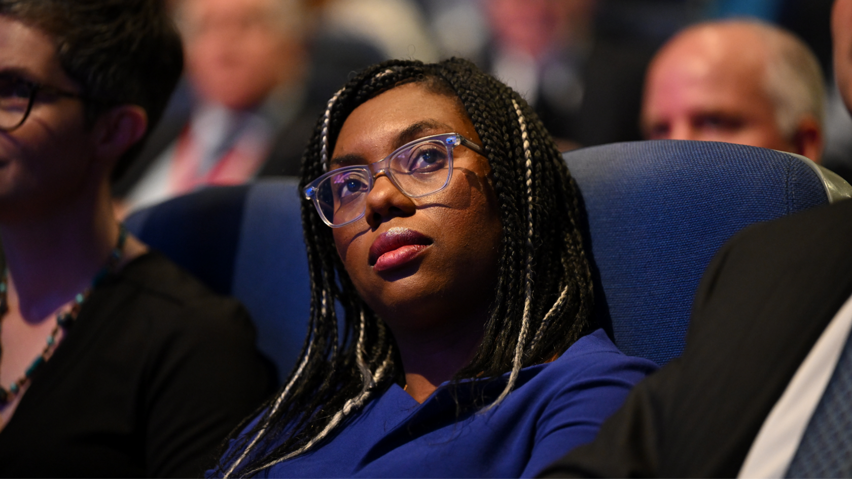 Kemi Badenoch stares at the stage at the 2022 Conservative Party conference