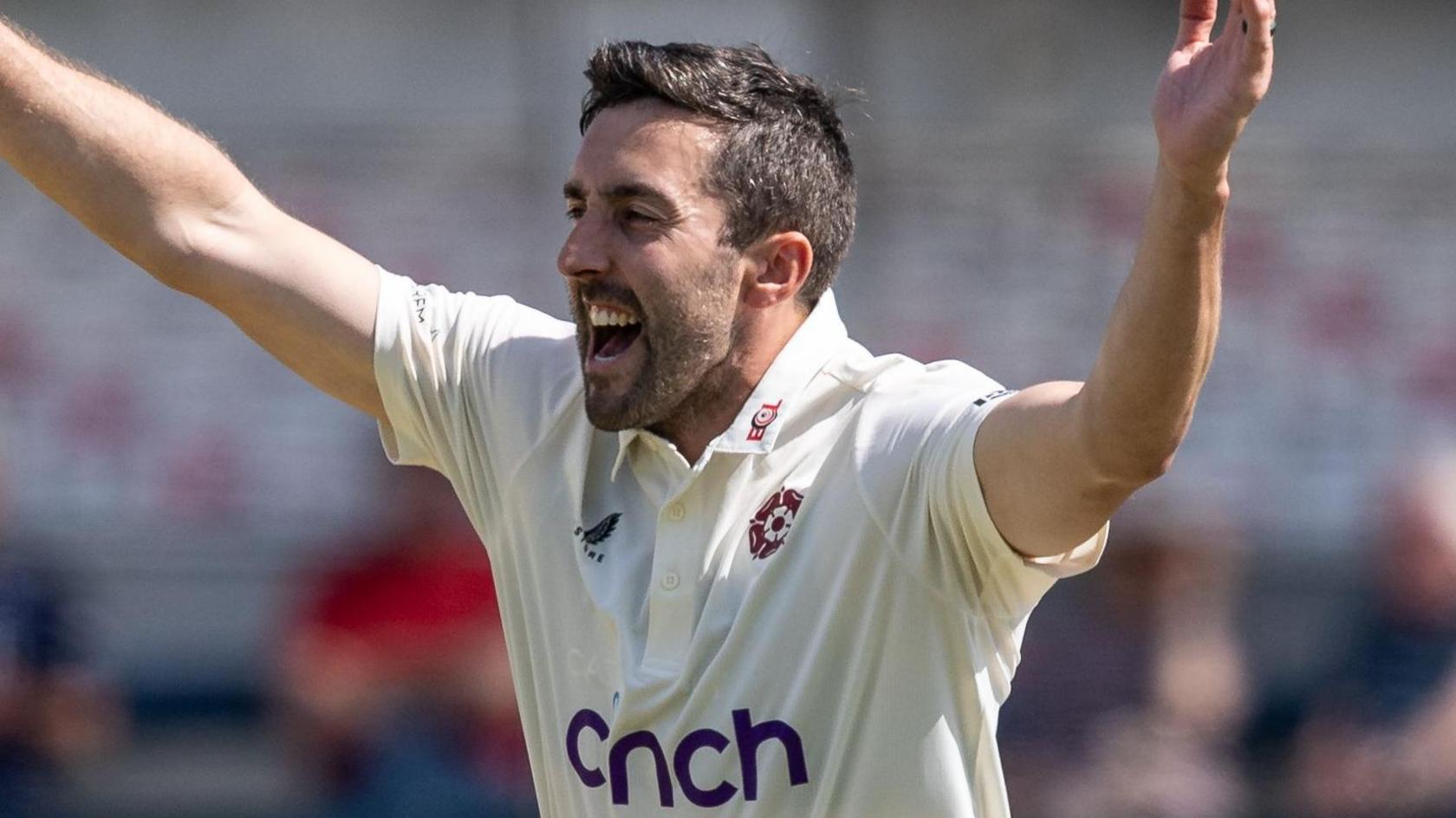 Ben Sanderson celebrates taking wicket