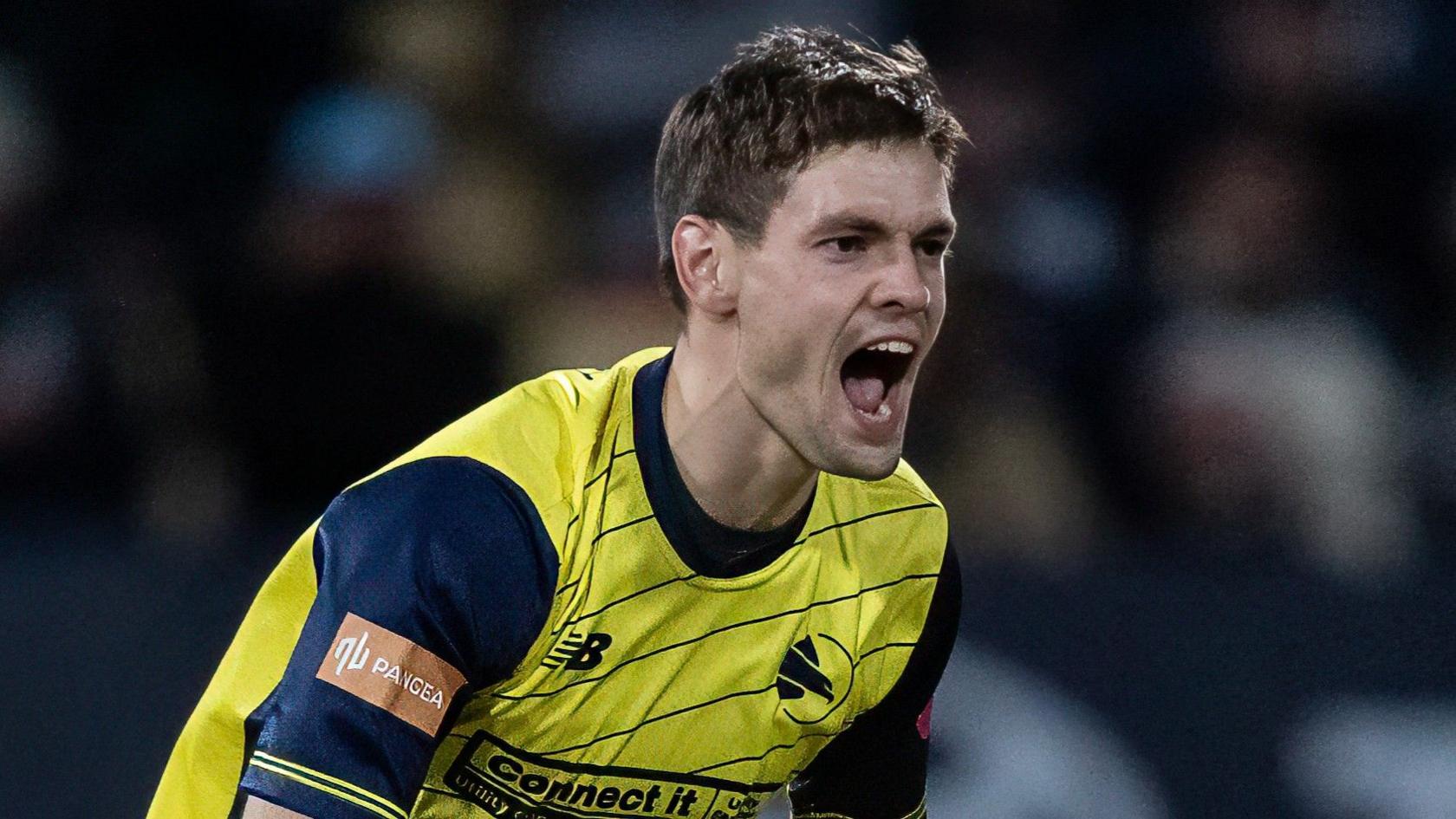 Hampshire bowler Scott Currie celebrates taking a wicket connected T20 Finals Day