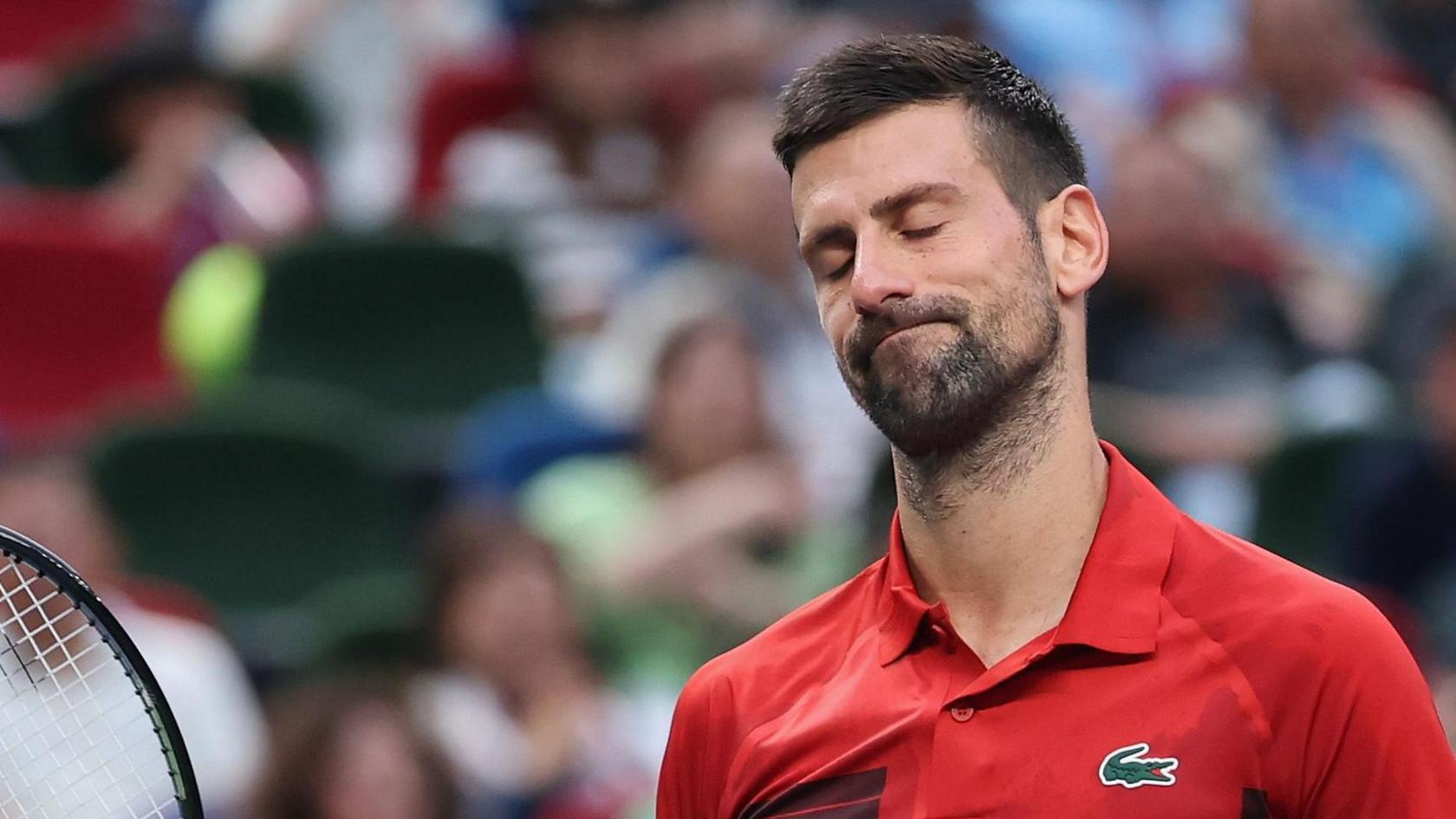 Novak Djokovic grimaces during the Shanghai Masters final against Jannik Sinner