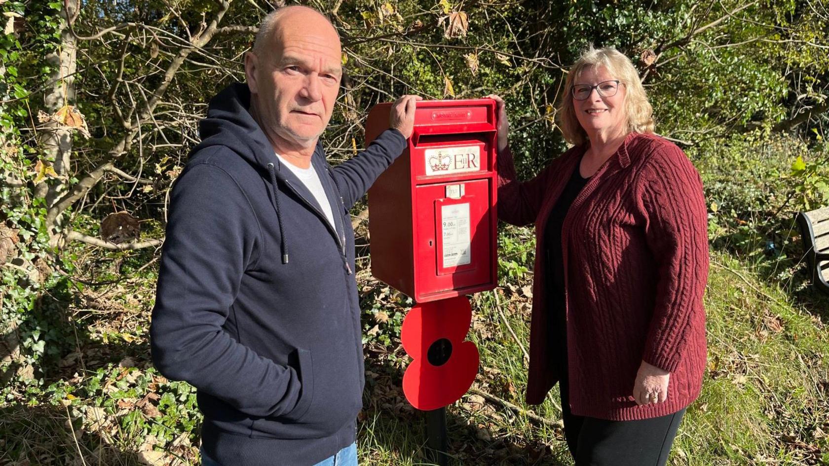 Dorking residents beside post box