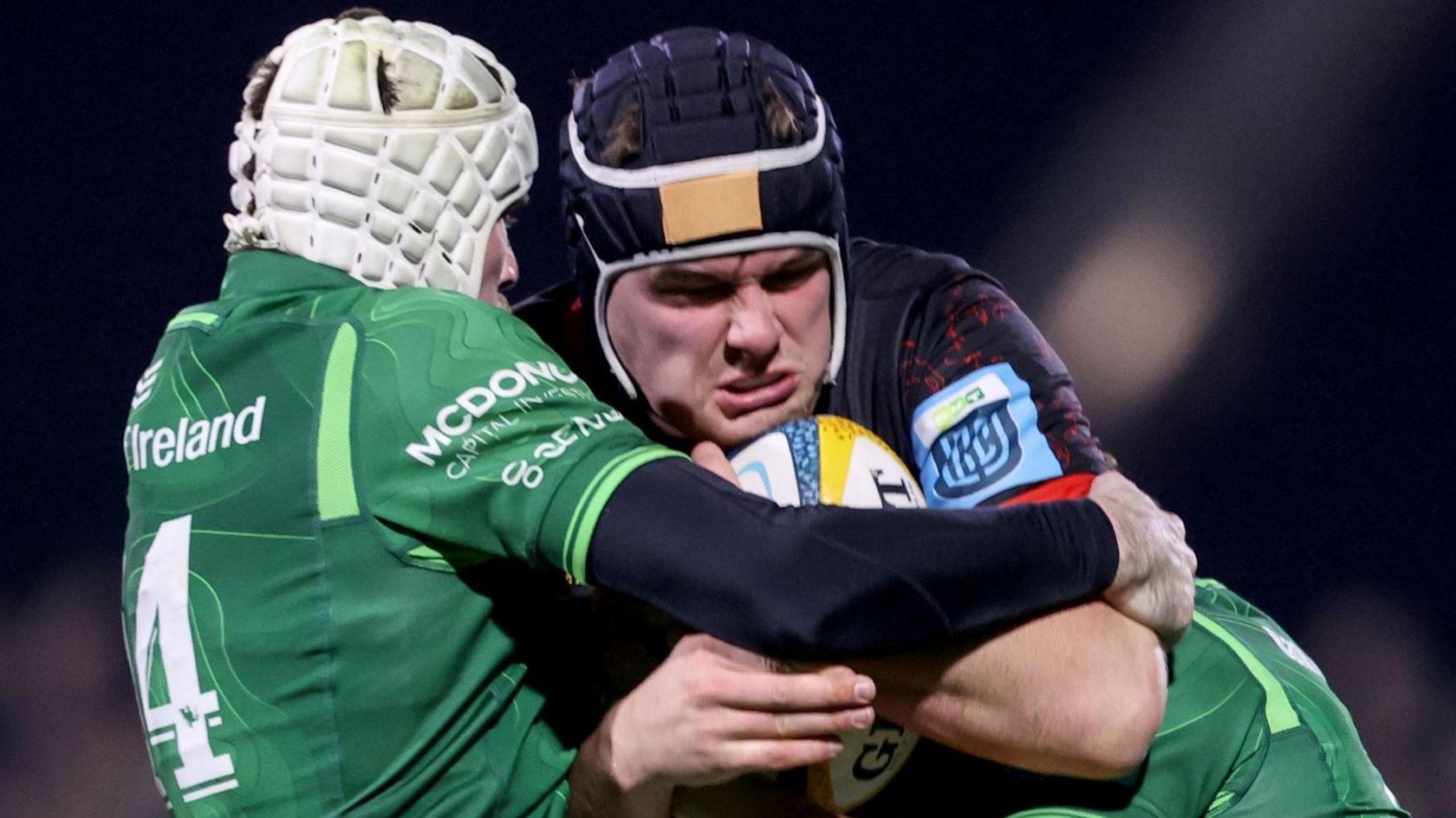 Connacht's Mack Hansen attempts to halt Ulster's number eight James McNabney