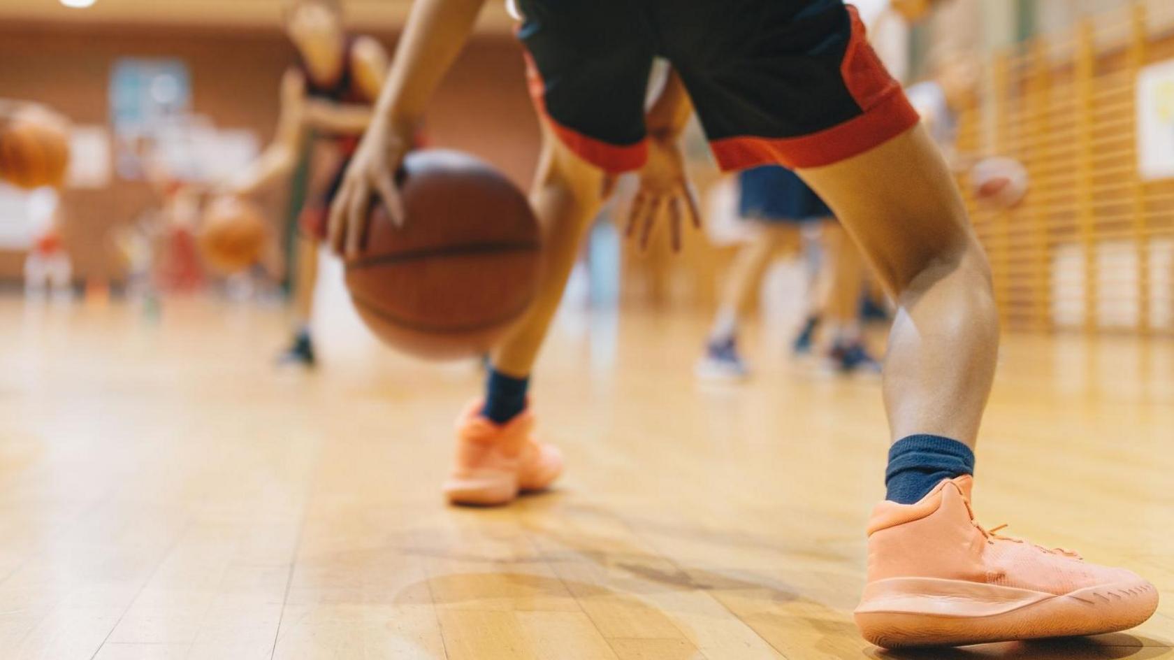 An image of a person playing basketball