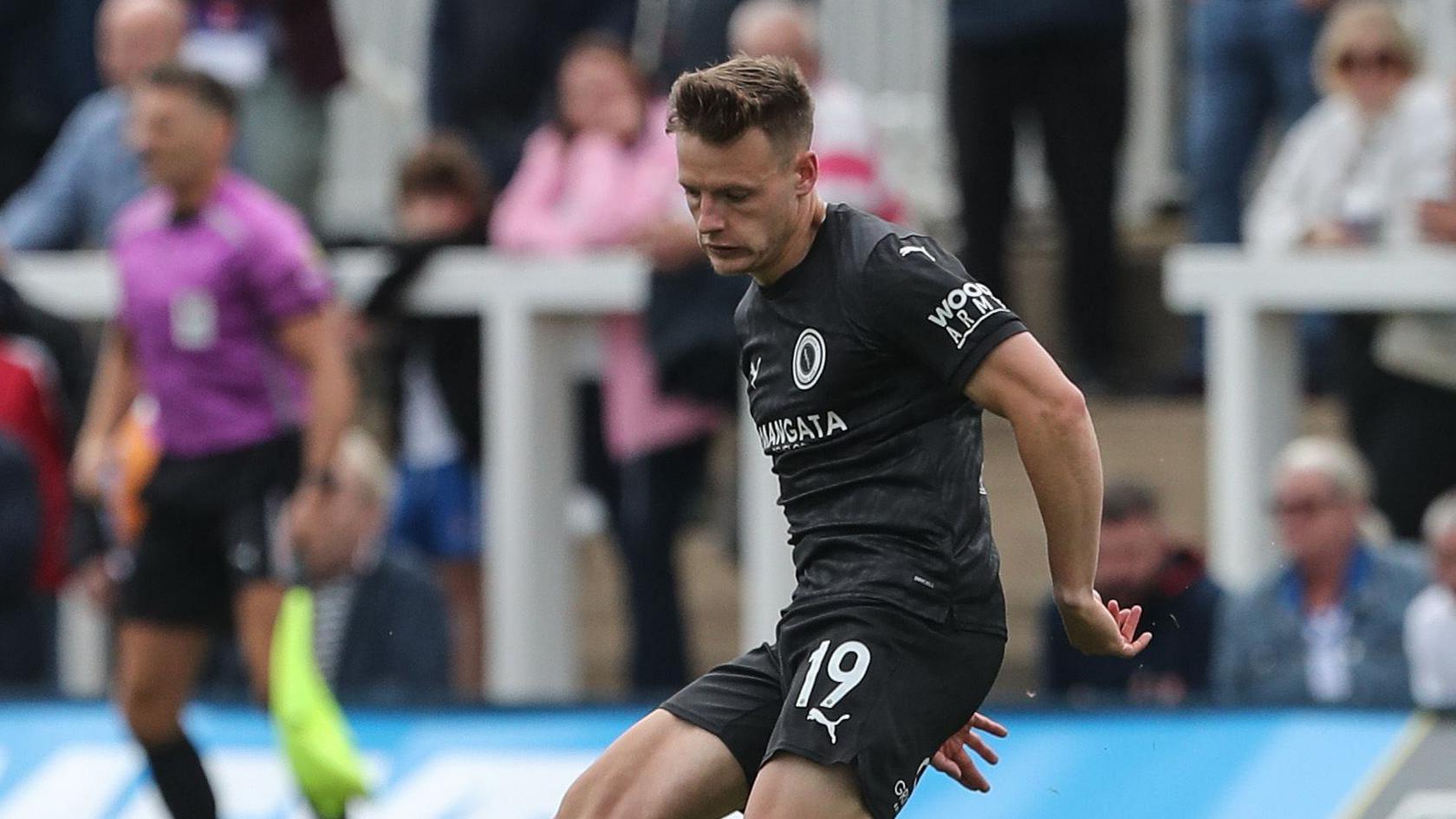 Tom White playing for Boreham Wood