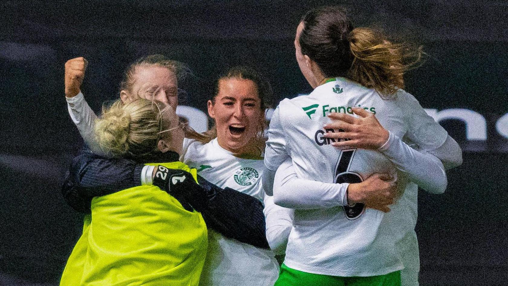 Hibs players celebrate after Kathleen McGovern (centre) makes it 2-0