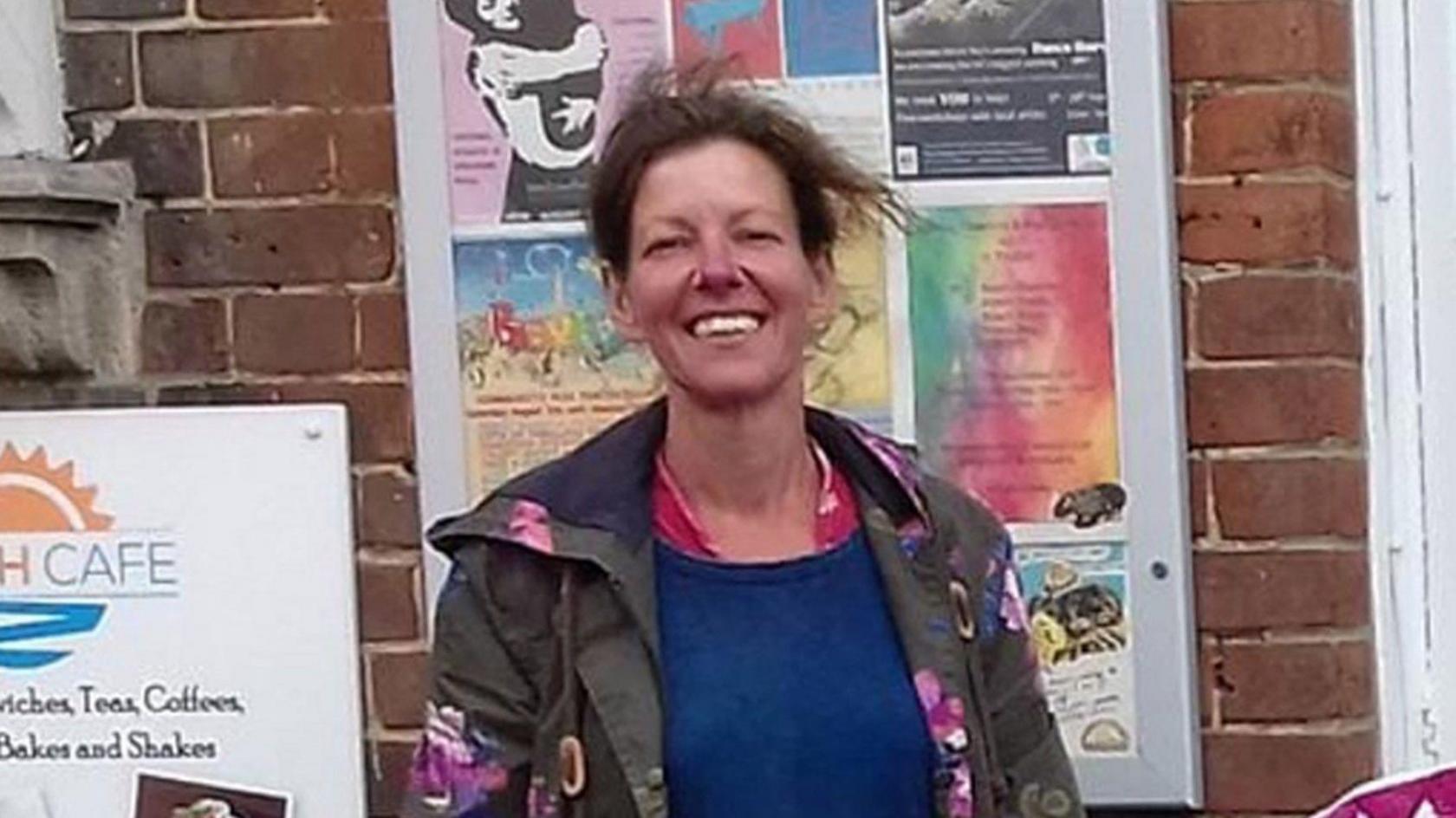 Undated handout photo issued by Kent Police of Claire Knights. She is wearing a green jacket with large pink flowers on it and a blue sweatshirt. She is smiling at the camera while stood in front of a notice board attached to a brown brick wall.