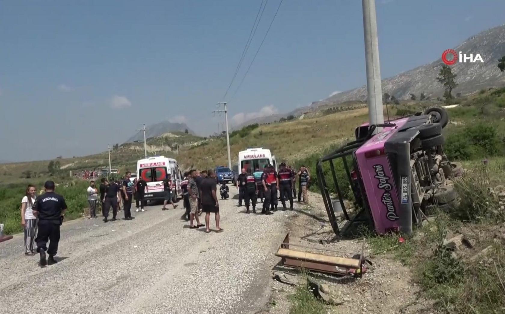 The wreckage of the vehicle at the side of the road