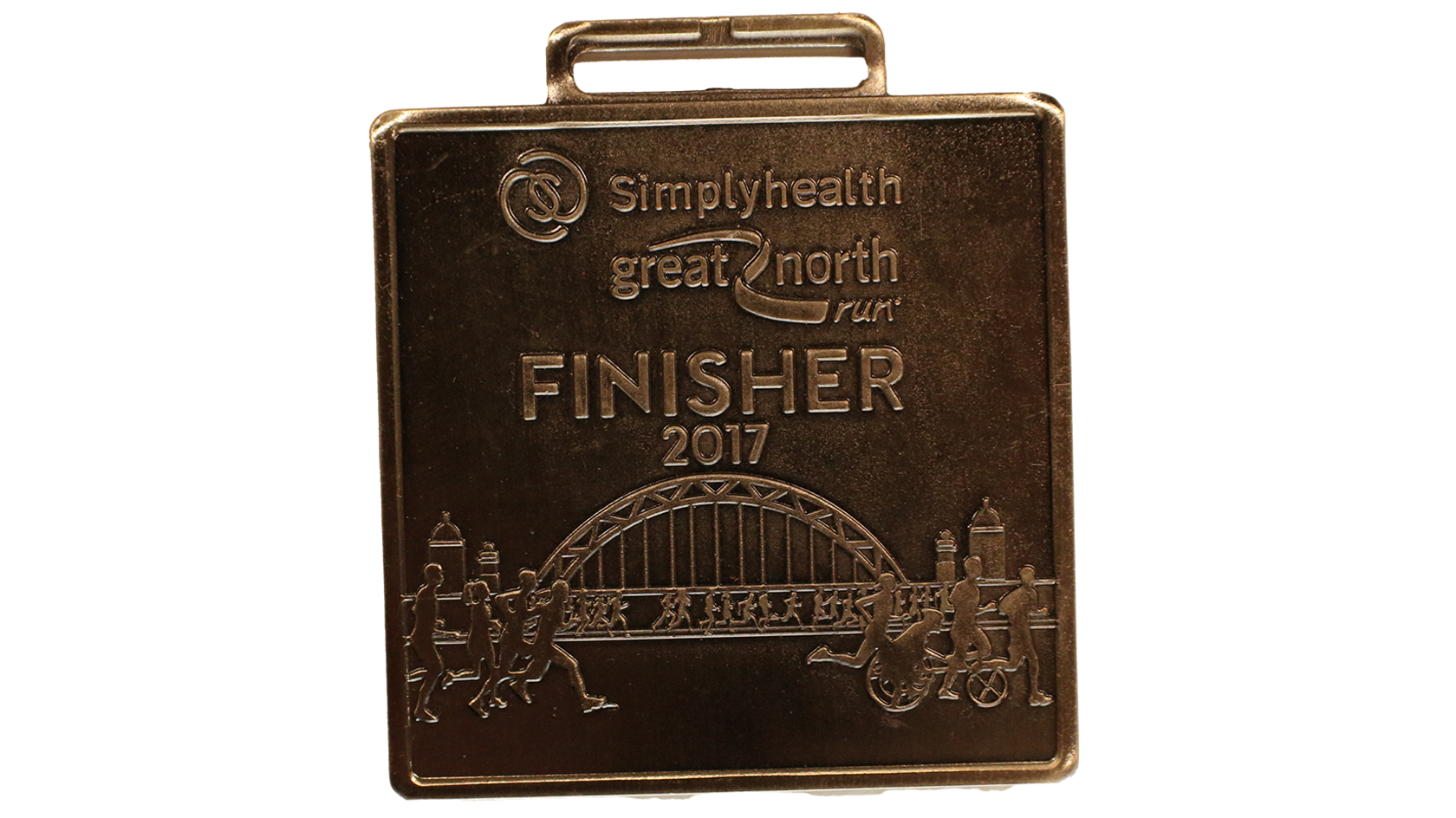 The 2017 medal opted to return to a square shaped design. Reading 'Simplyhealth great north run' at the top, and in the centre 'Finisher 2017', Underneath is a picture of runners running past the Tyne Bridge. 