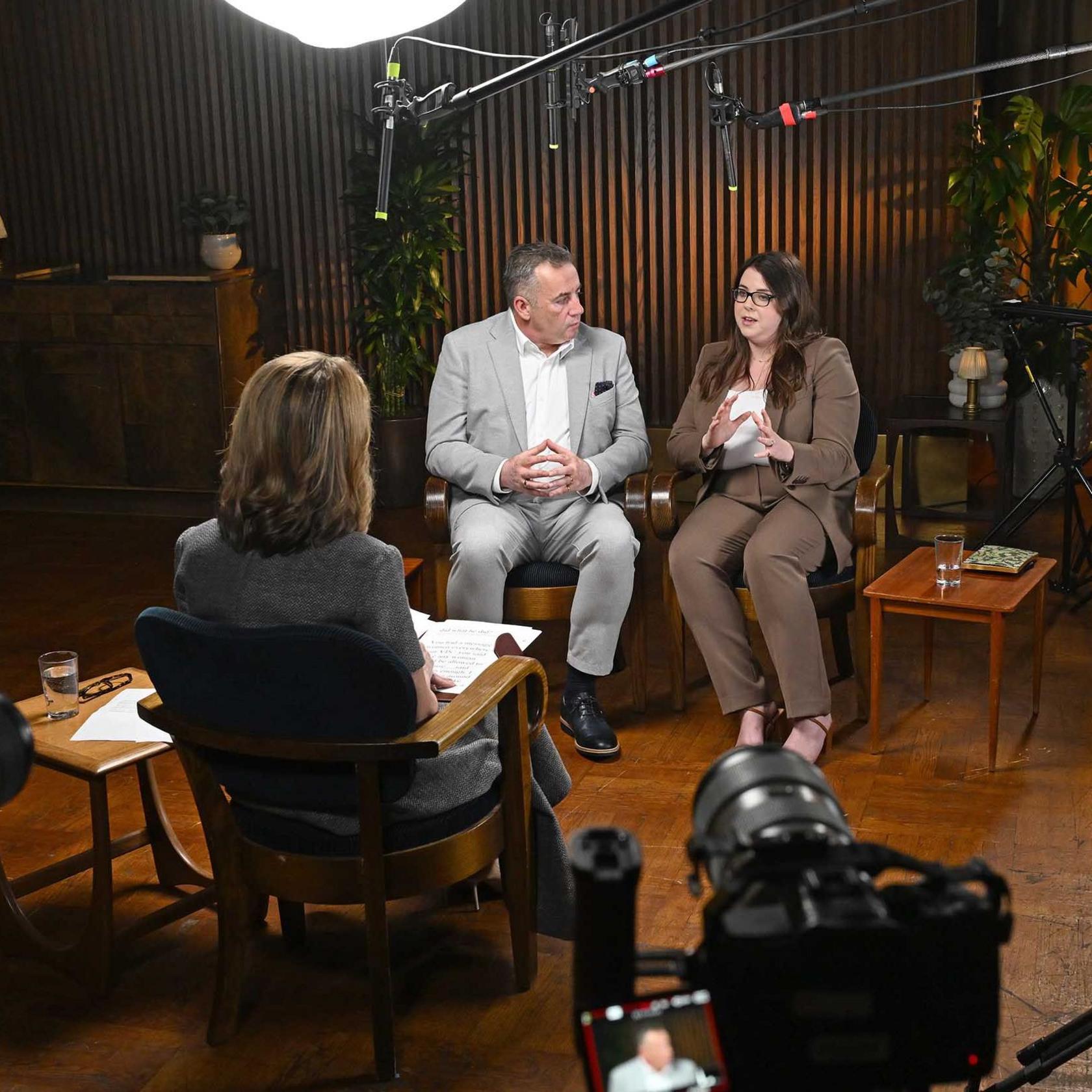 Image showing John Hunt, wearing a grey suit, and his daughter Amy Hunt, wearing a brown suit, speaking during an interview with the BBC's Victoria Derbyshire