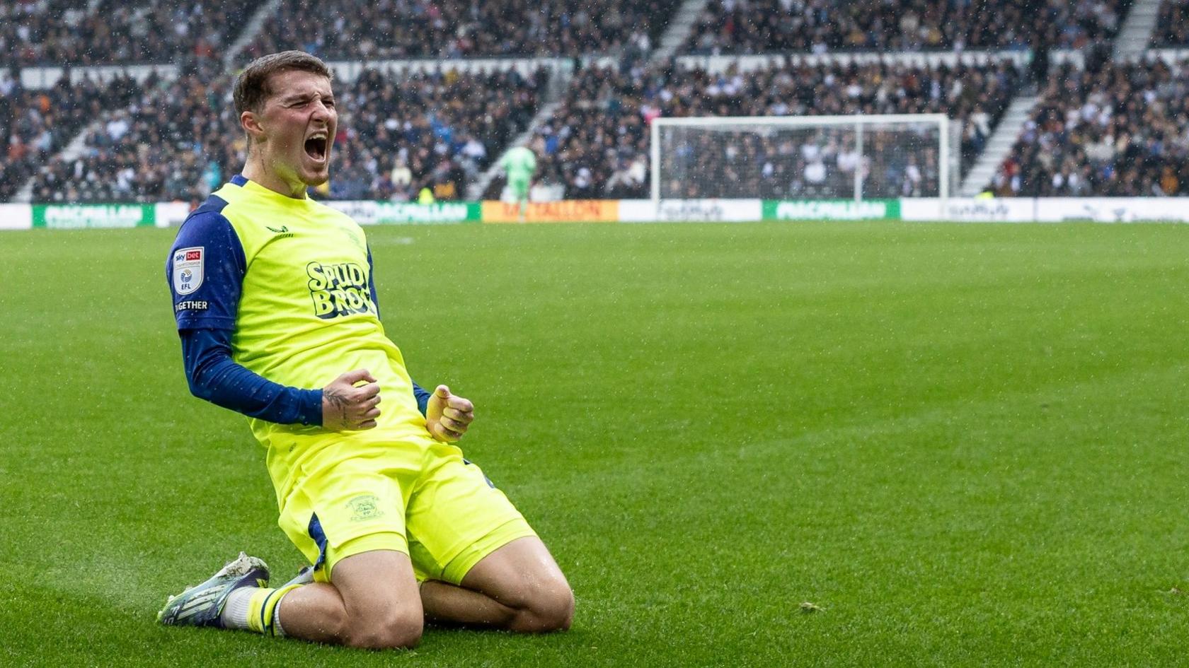 Alfie Devine celebrates his goal for Preston at Derby