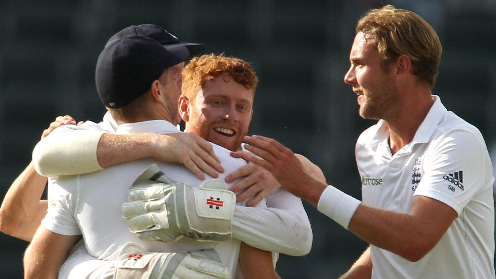 England's players celebrate the run out of Temba Bavuma