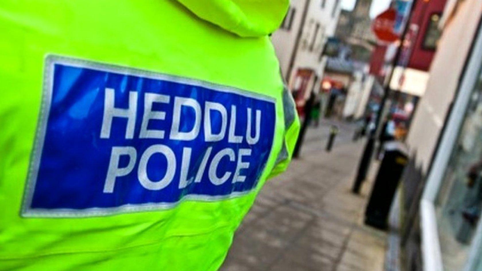 Police officer on a street in Wales