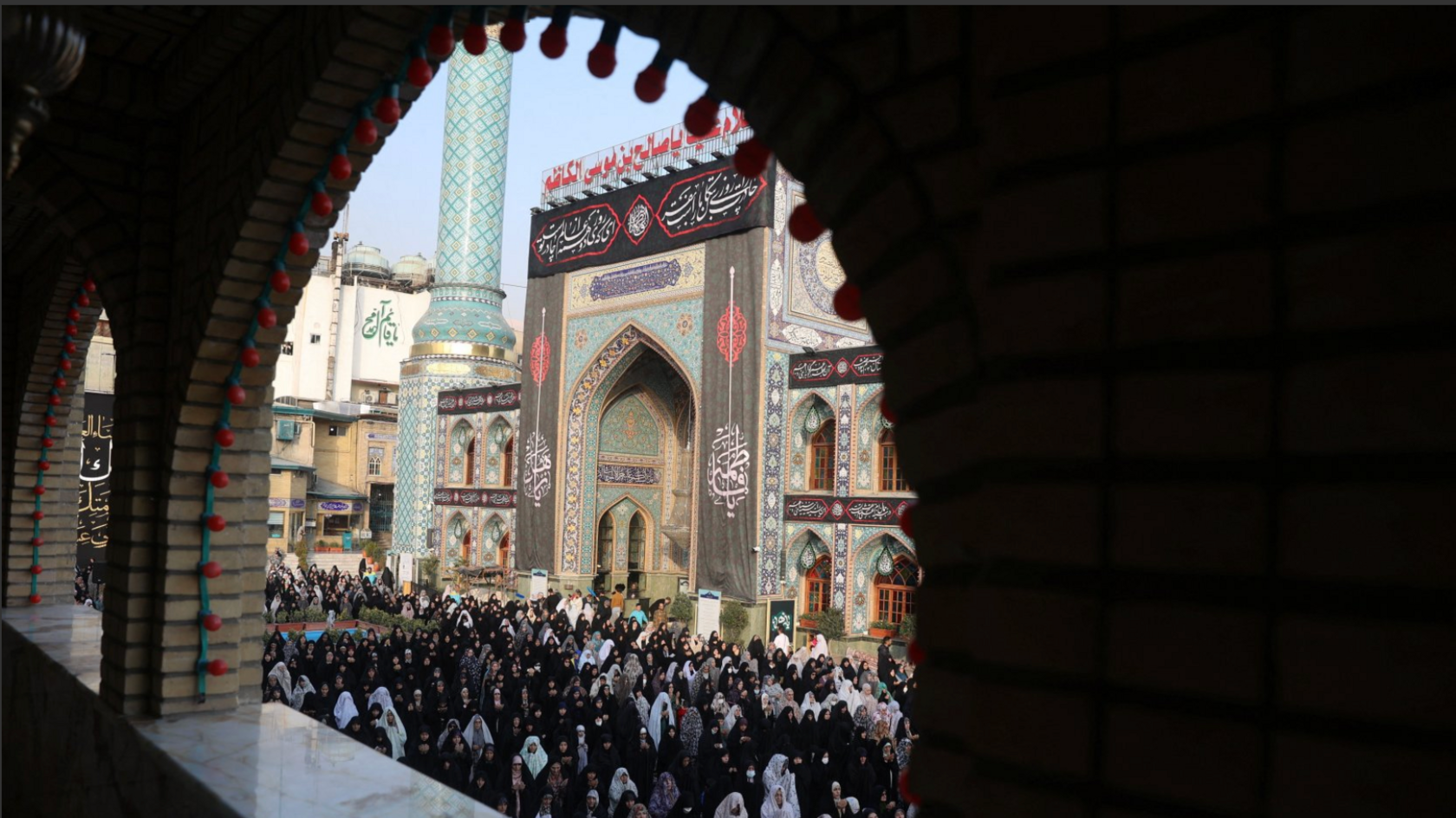Iranian women pray for rain following a drought crisis at Imamzadeh Saleh shrine in Tehran, Iran