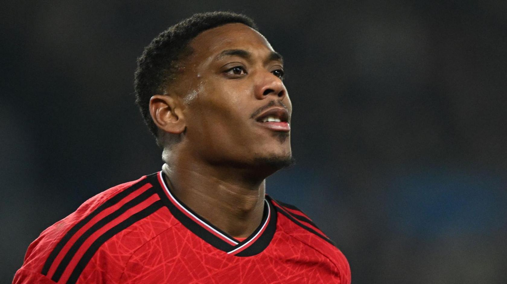 Anthony Martial looks on