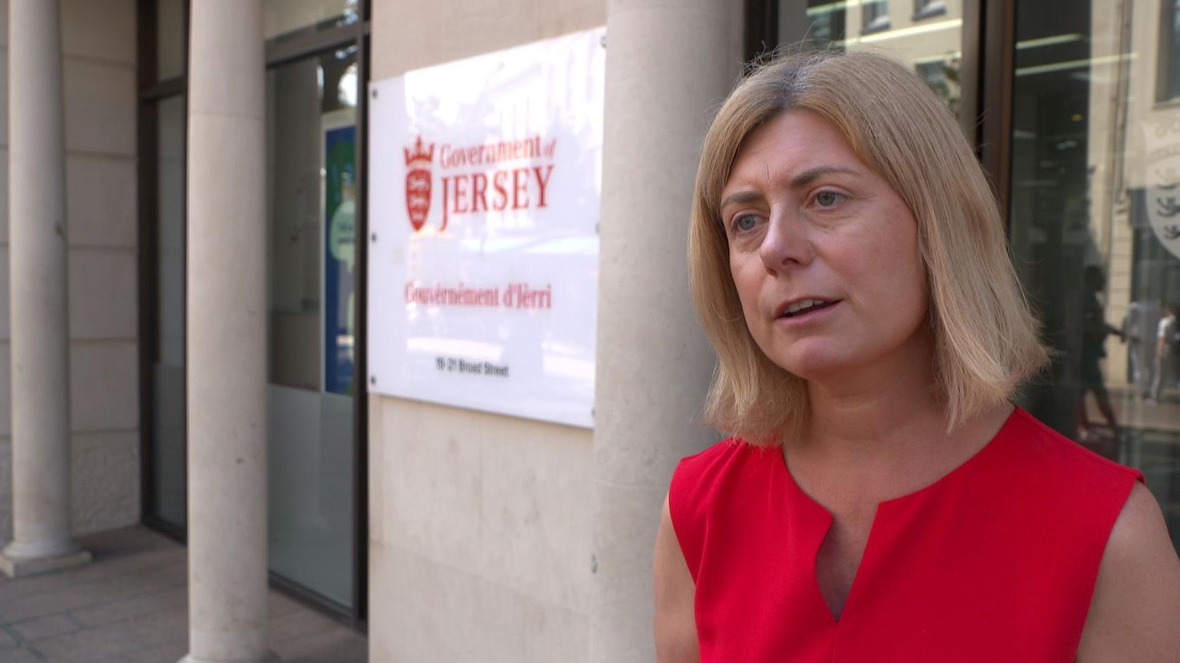 Deputy Lyndsay Feltham, the Social Security Minister, speaking outside Jersey's Government headquarters in Broad Street.