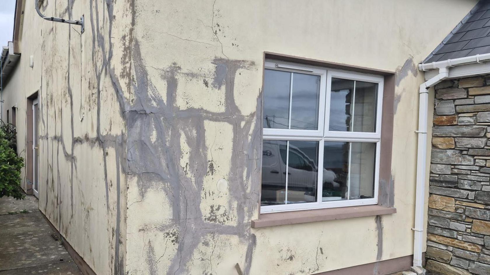 A house with large structural cracks 