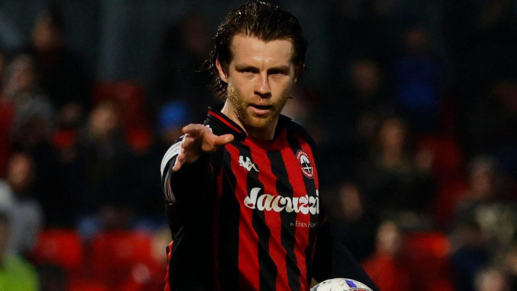 Tyler Harvey celebrates scoring against Gateshead