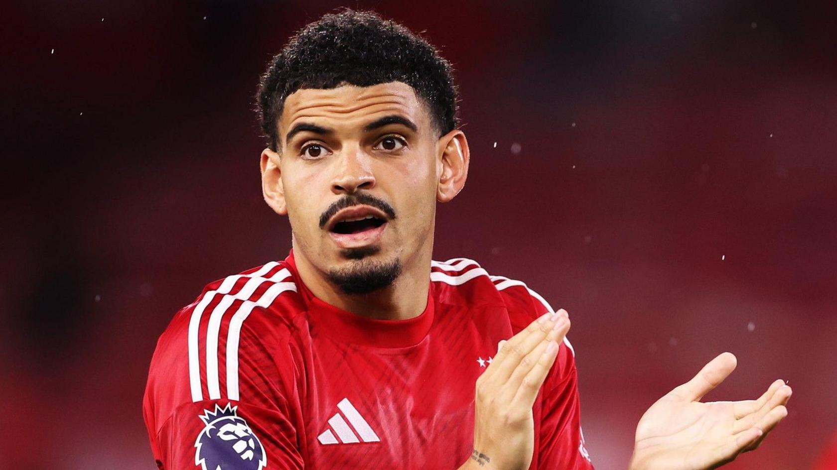 Morgan Gibbs-White claps fans while playing for Nottingham Forest