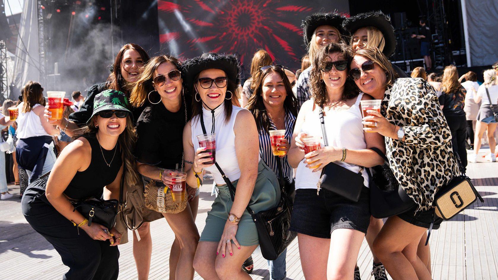 A group of women smile at the camera at the BS3 live event at Ashton Gate